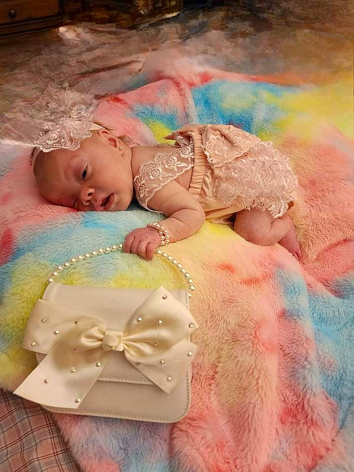 Jasmine is registered to the contest to win money with this photo: art, baby, baby_products, baby_toddler_clothing, bedtime, cheek, child, fashion_accessory, happy, jewellery, linens, pattern, peach, person, pink, portrait_photography, room, sleep, toddler, visual_arts