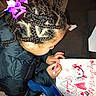 Felicia a rejoint le concours — aidez-le/la à gagner de superbes lots ! art_activity, backpack, braids, child, close_up, concentration, doodle, drawing, hair_clip, hands, indoor, napkin, pink_marker, portrait, puffer_jacket, seat, sofa, tiled_floor, top_view, young_child