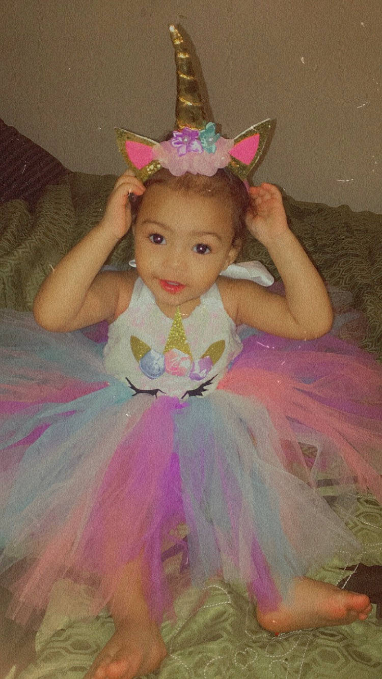 Estella is registered to the contest to win money with this photo: baby_toddler_clothing, ballet_tutu, beauty, child, costume_hat, dress, fashion, fun, hairstyle, happy, headgear, headpiece, magenta, mythical_creature, party_hat, person, pink, product, purple, textile