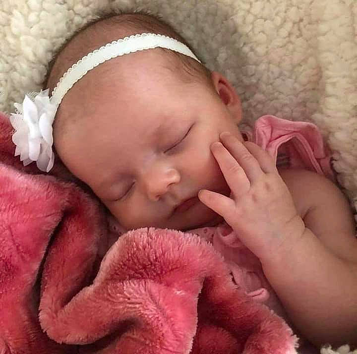 Karley is registered to the contest to win money with this photo: arm, baby_sleeping, baby_toddler_clothing, cheek, chin, comfort, ear, eye, eyebrow, eyelash, facial_expression, hair, hand, head, human, lip, mouth, nose, organ, person