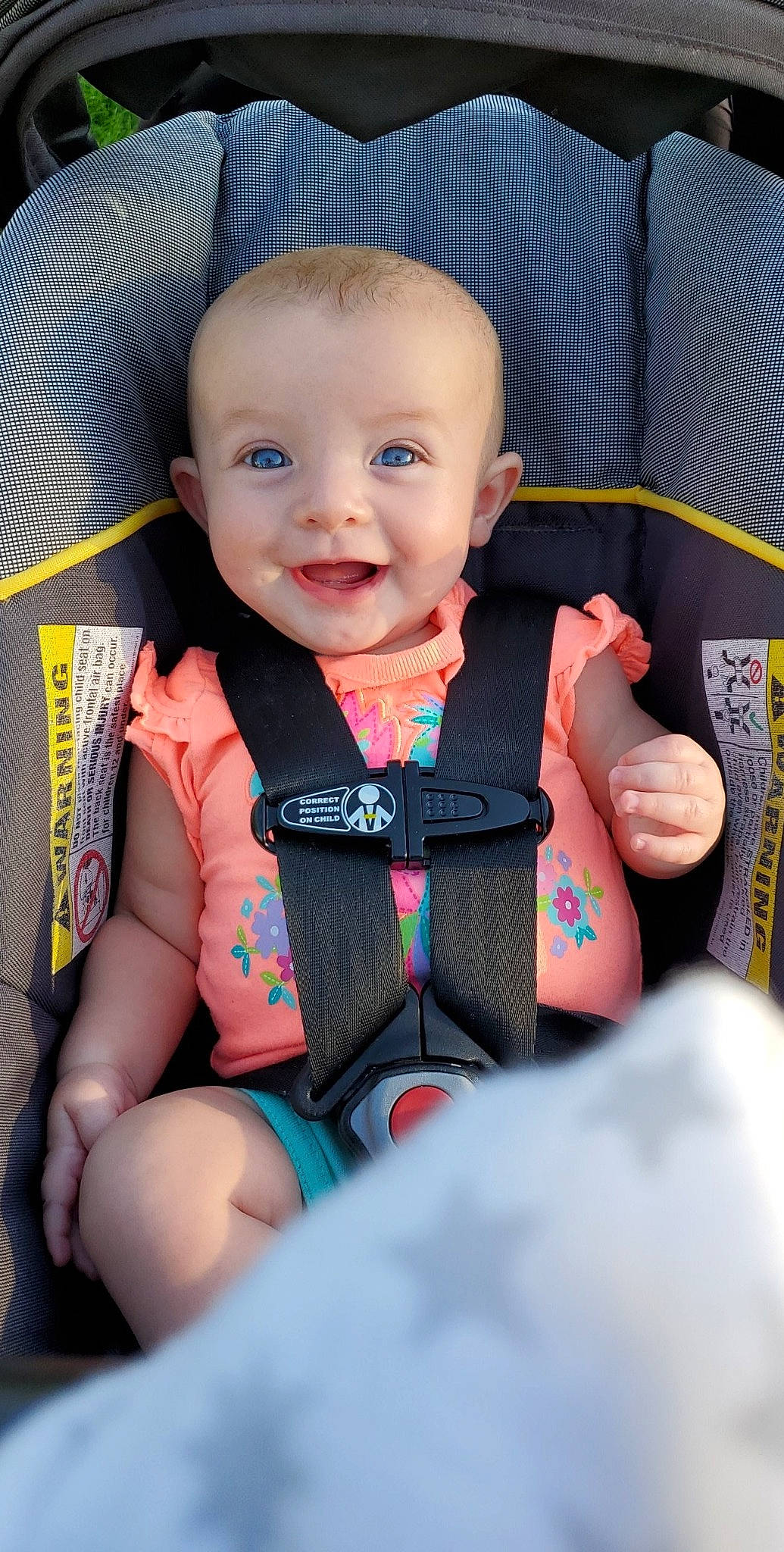 Emrie is registered to the contest to win money with this photo: baby, baby_carriage, baby_in_car_seat, baby_products, car_seat, cheek, child, finger, joy, person, product, seat_belt, skin, toddler