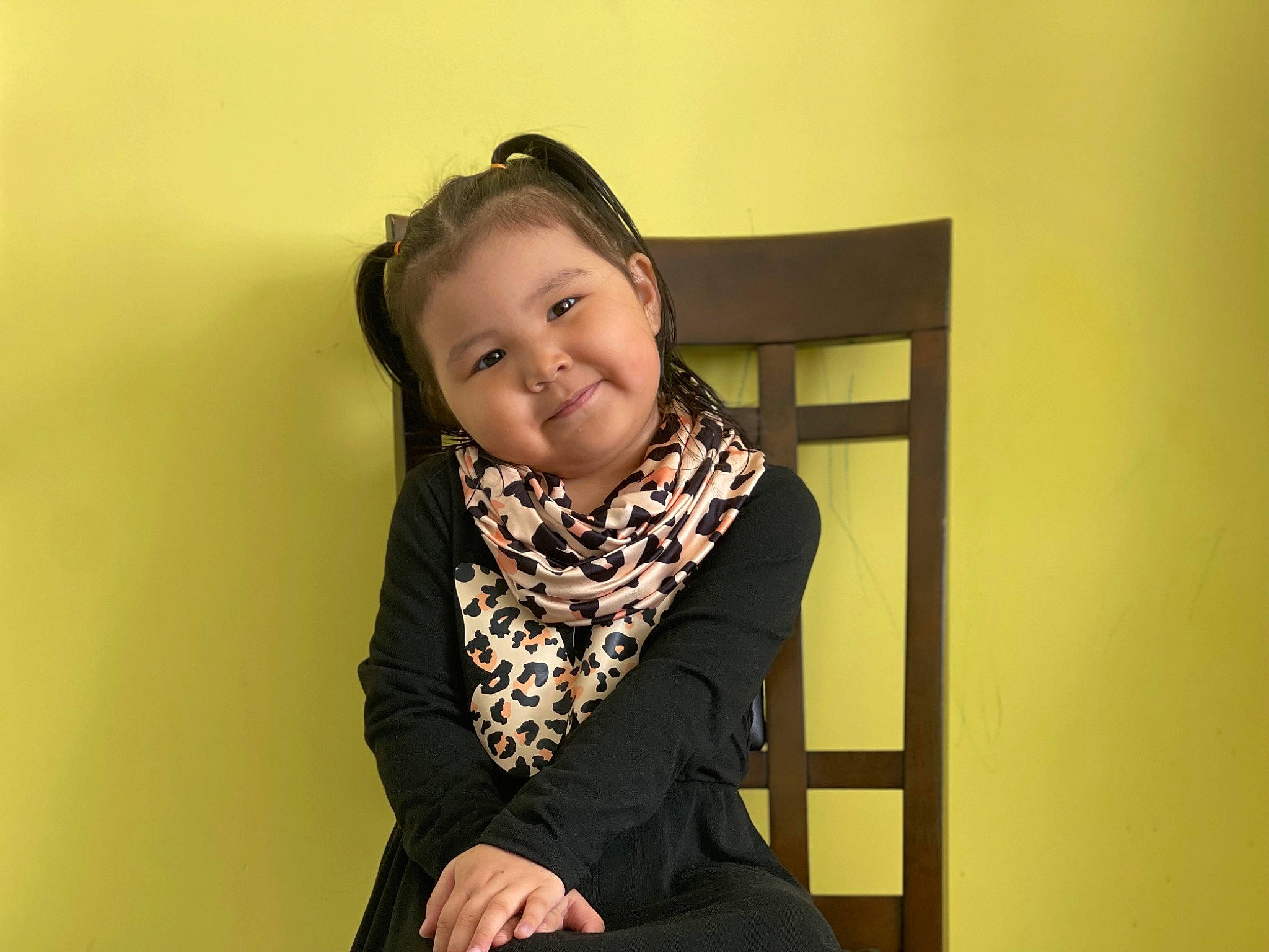 Jessica is registered to the contest to win money with this photo: child, fashion_accessory, fashion_design, flash_photography, formal_wear, fun, happy, joy, laugh, pattern, person, photo_shoot, portrait, portrait_photography, scarf, shawl, sitting, sleeve, smile, stole
