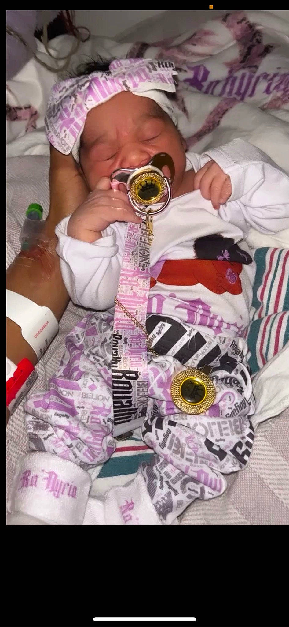 Kanyria Royalty is registered to the contest to win money with this photo: baby, baby_sleeping, baby_toddler_clothing, beauty, comfort, event, eyewear, hat, headwear, linens, magenta, pattern, person, photograph, pink, product, purple, sun_hat, sunglasses, toddler