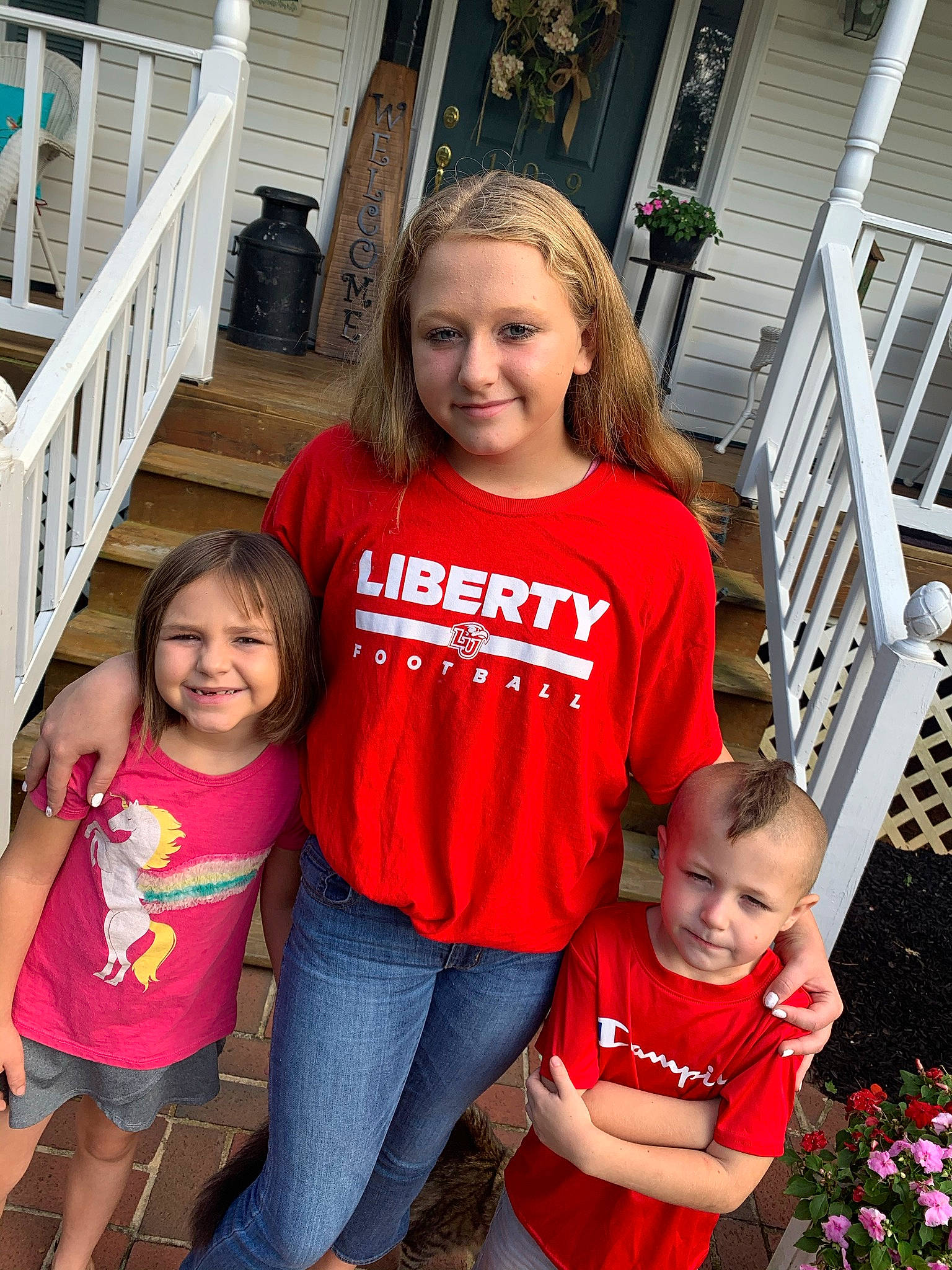 Kendra joined the competition — help win amazing prizes! chair, clothing, event, face, fun, happy, jeans, joy, lap, leisure, person, plant, recreation, red, shorts, sleeve, smile, stairs, t_shirt, thigh