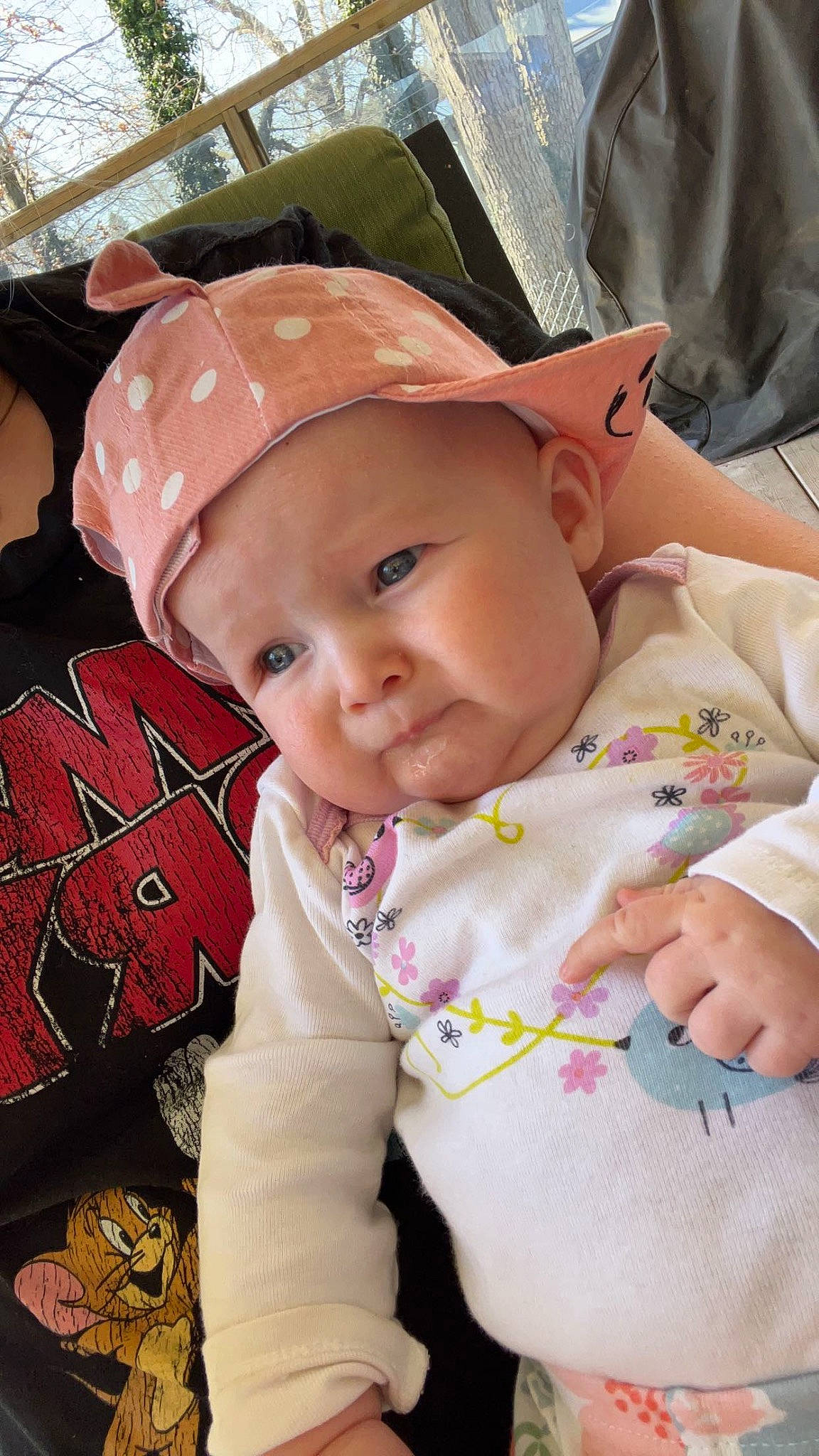 Ariya is registered to the contest to win money with this photo: baby, baby_products, baby_toddler_clothing, bib, cap, carmine, cheek, child, fashion_accessory, happy, hat, lip, pattern, person, pink, product, sitting, skin, sleeve, smile