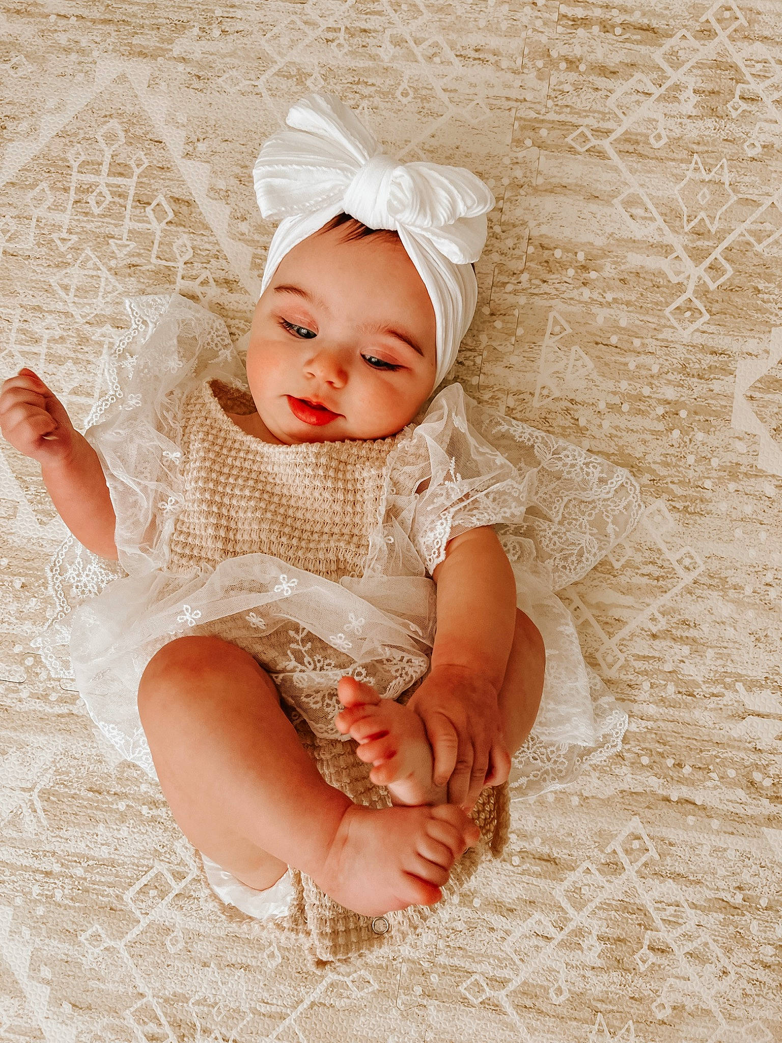 Holland joined the competition — help win amazing prizes! baby, baby_toddler_clothing, bridal_accessory, clothing, dress, embellishment, eye, facial_expression, flash_photography, flooring, grass, happy, headgear, headpiece, headwear, person, pink, skin, smile, textile