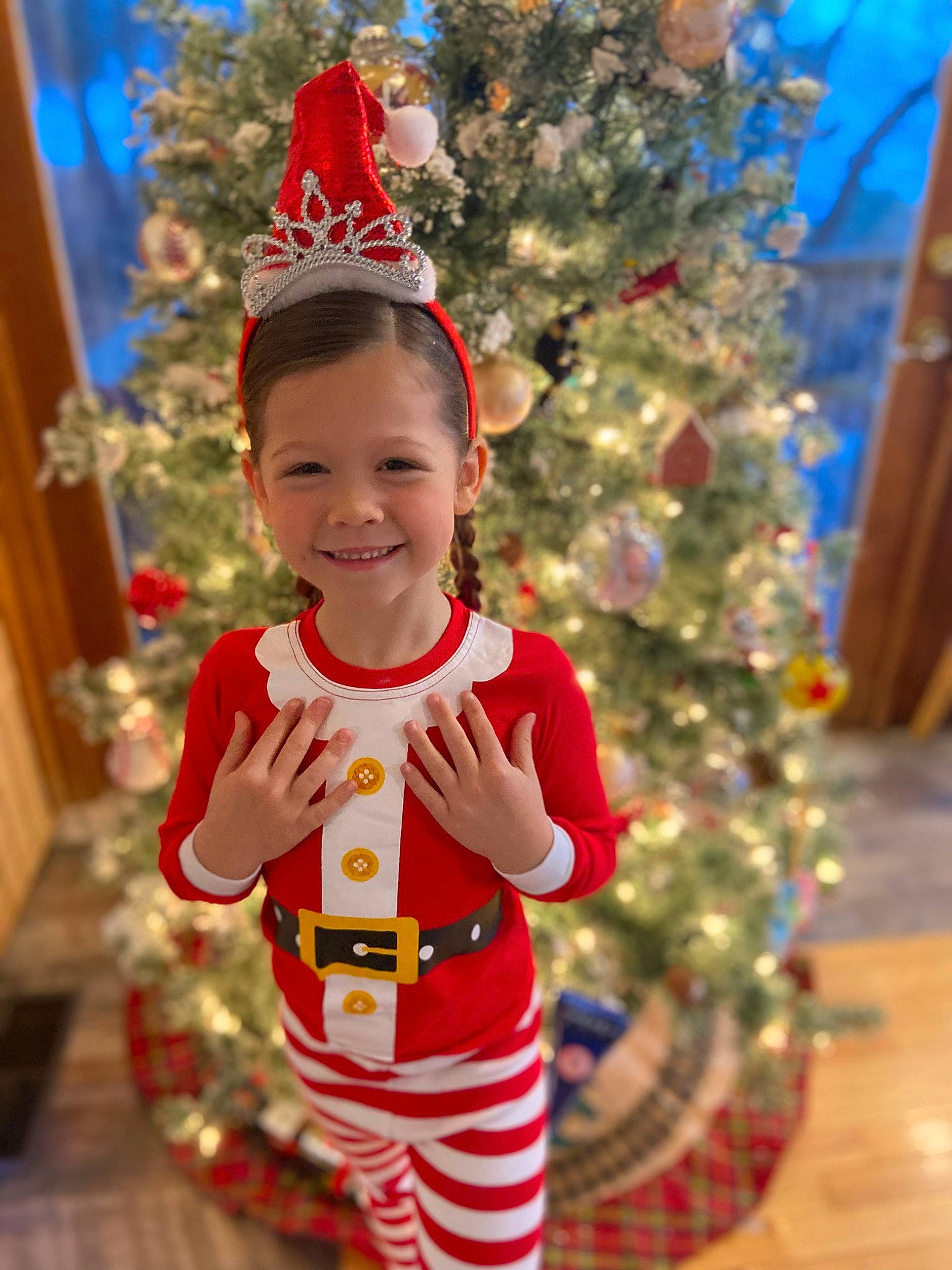 Tessa joined the competition — help win amazing prizes! baby_toddler_clothing, blue, christmas, christmas_decoration, christmas_ornament, christmas_tree, costume_hat, event, face, fun, happy, head, headgear, holiday, holiday_ornament, human_body, joy, person, sleeve, smile