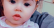 Alexis joined the competition — help win amazing prizes! blinds, butterfly_filter, buttoned_shirt, child, closeup, curly_hair, cute, digital_filter, expression, face, hair_puffs, hand, indoor, person, pink_outfit, portrait, sitting, toddler, window, young_child