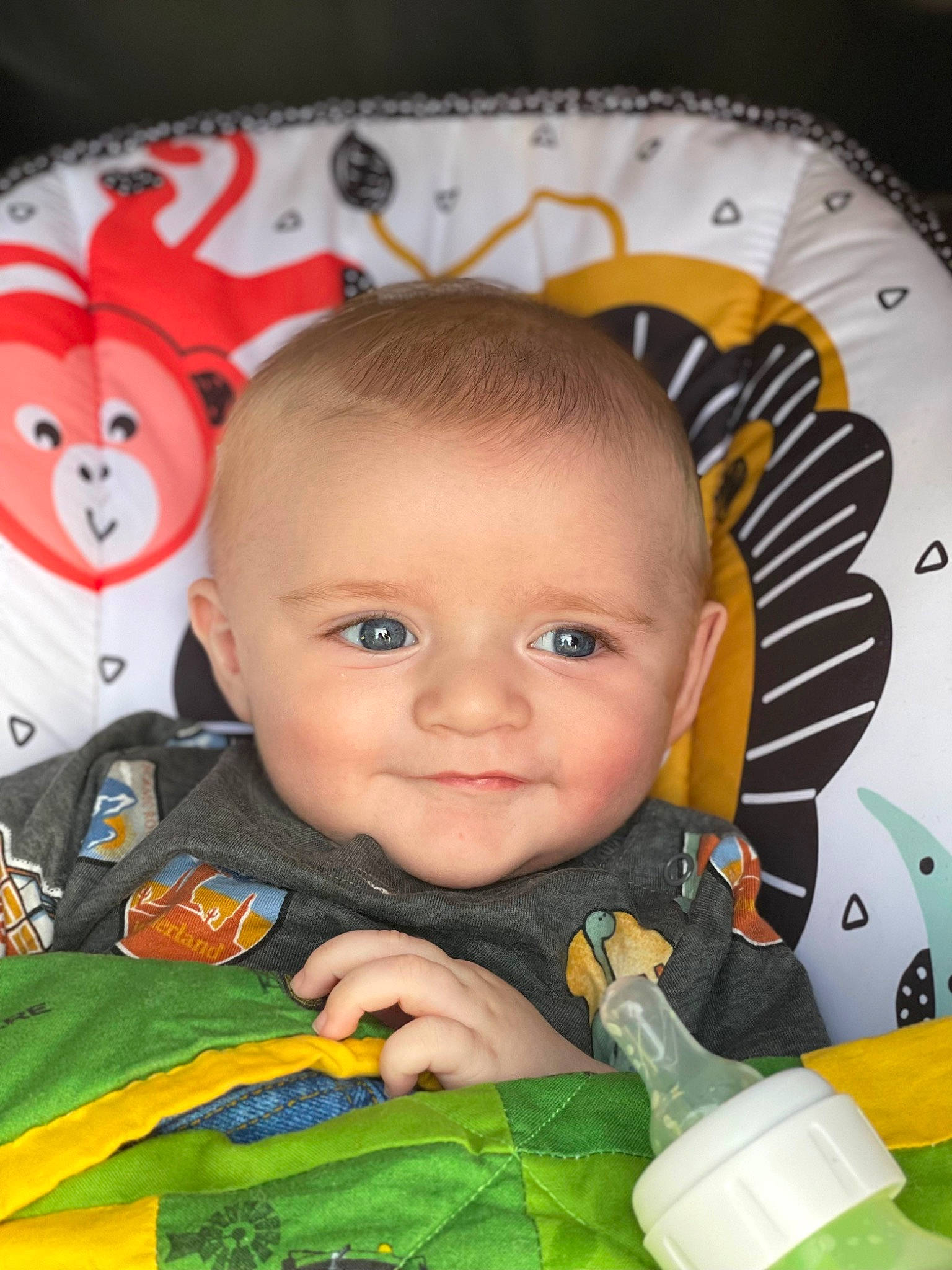 Monroe is registered to the contest to win money with this photo: baby, baby_products, baby_toddler_clothing, bottle, cheek, child, eye, fun, happy, head, iris, joy, nose, orange, person, plastic, plastic_bottle, product, room, skin