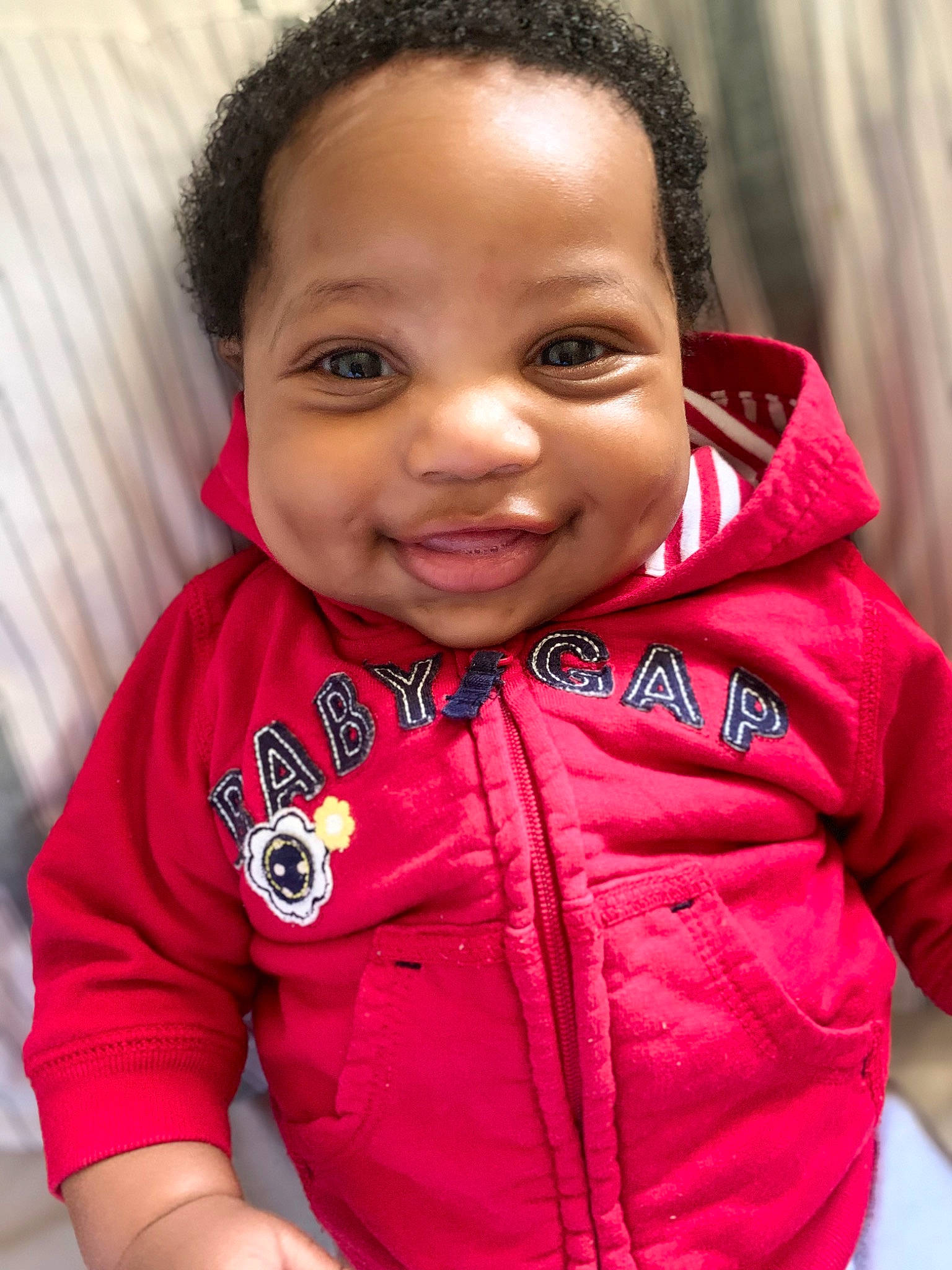 Tristan is registered to the contest to win money with this photo: arm, beauty, cheek, child, cool, forehead, fun, hair, happy, head, joy, lip, mammal, neck, nose, person, red, skin, sleeve, smile