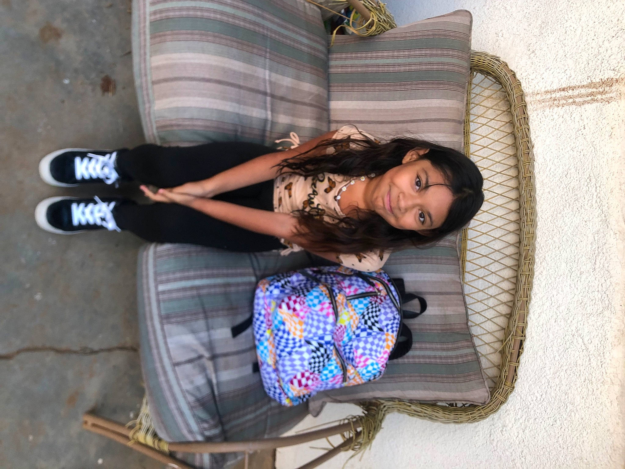 Unique Garcia joined the competition — help win amazing prizes! bag, comfort, denim, fashion_accessory, fun, hair, human_leg, joy, knee, lap, leg, leisure, linens, luggage_and_bags, pattern, person, shoe, sitting, sneakers, thigh