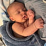 baby, infant, newborn, sleeping, blanket, swaddle, blue_blanket, cozy, portrait, face, hand, arm, crib, nursery, soft_texture, peaceful, closeup, eyelashes, skin, resting