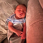 Hayden participe au concours pour gagner de l'argent avec cette photo : baby, sleeping, infant, swaddle, couch, pillow, bottle, cozy, peaceful, child, indoor, rest, soft, blanket, hands, face, nap, young, comfortable, home