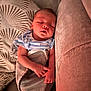 baby, sleeping, infant, swaddle, couch, pillow, bottle, cozy, peaceful, child, indoor, rest, soft, blanket, hands, face, nap, young, comfortable, home
