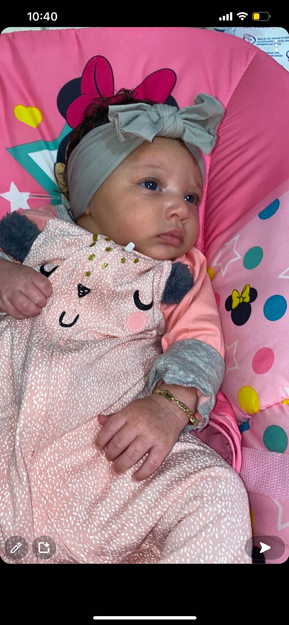 Jolie is registered to the contest to win money with this photo: baby, baby_products, baby_toddler_clothing, beauty, cap, cheek, child, comfort, finger, happy, headwear, linens, magenta, pattern, person, pink, sitting, skin, sleeve, textile