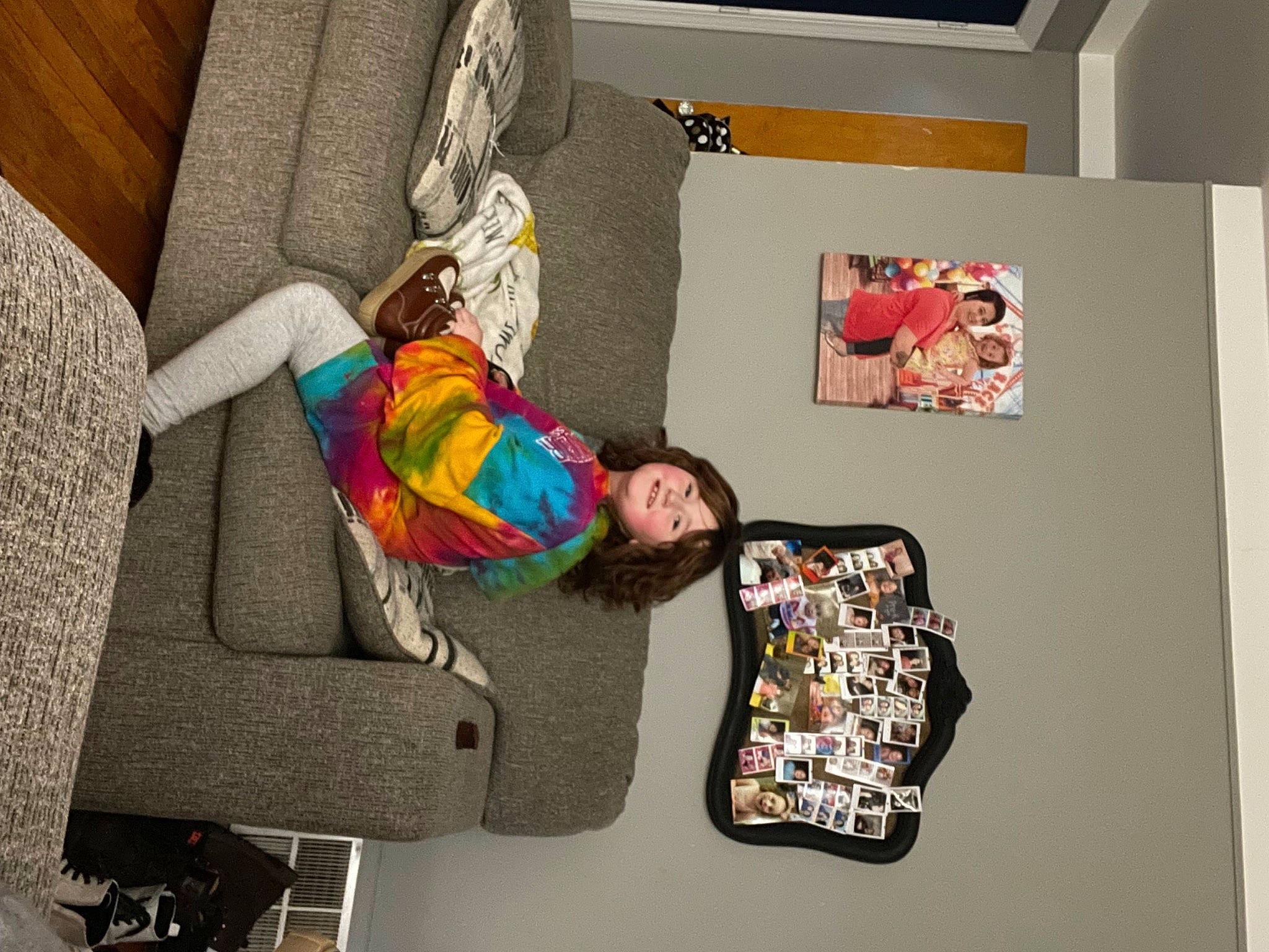 Jacklynn joined the competition — help win amazing prizes! art, child, comfort, flooring, fun, joy, leisure, linens, person, picture_frame, product, room, shelf, shelving, sitting, smile, t_shirt, textile, toddler, visual_arts