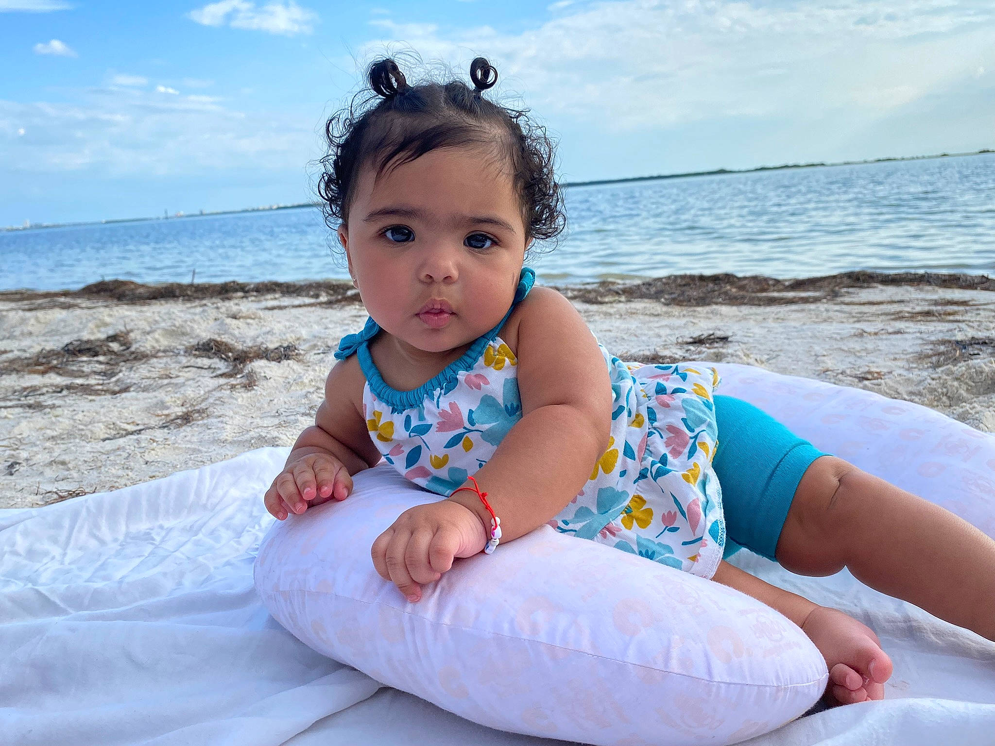 Zailynn is registered to the contest to win money with this photo: aqua, azure, baby, baby_toddler_clothing, beach, blue, cloud, comfort, eye, face, flash_photography, fun, hairstyle, happy, head, leisure, person, sky, sleeve, toddler