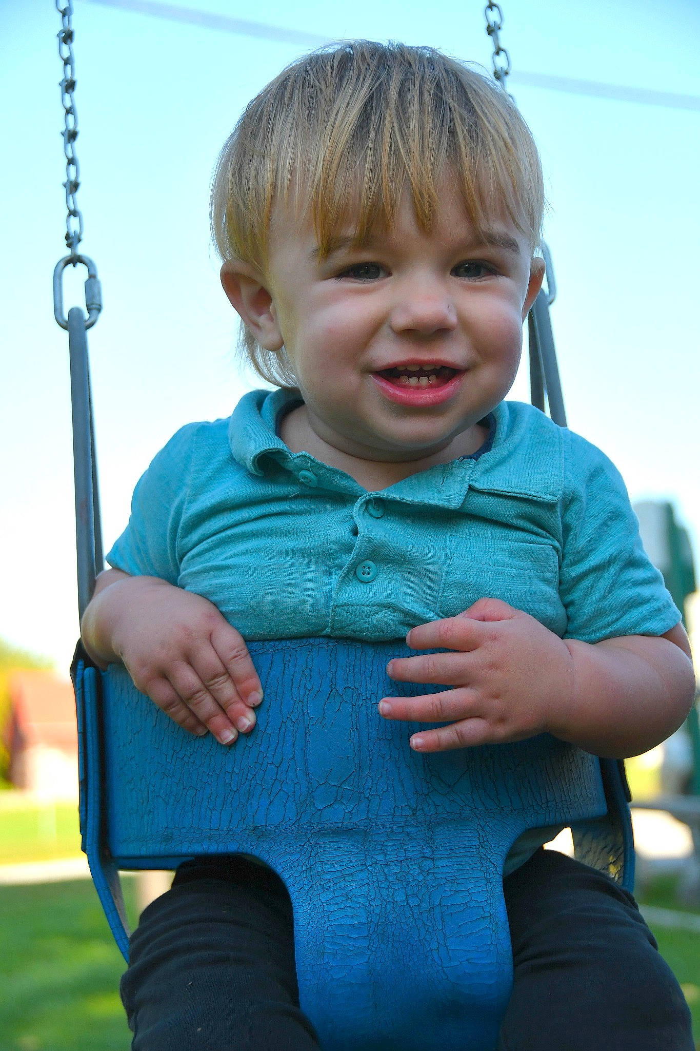 Artymus-zeke is registered to the contest to win money with this photo: baby, child, outdoor_play_equipment, person, play, playground, smile, swing, toddler