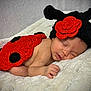 baby, sleeping, newborn, crochet, ladybug_costume, red, black, hat, flower, blanket, soft, cute, infant, resting, cute_costume, toddler, portrait, face, hand, cozy