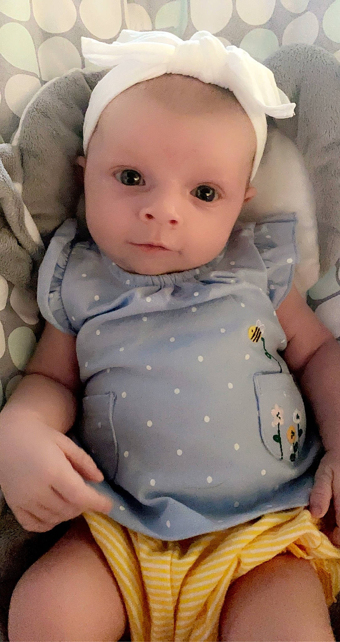 Dallis is registered to the contest to win money with this photo: baby, baby_toddler_clothing, cap, cheek, chin, doll, eye, eyelash, facial_expression, head, iris, lip, one_piece_garment, person, pink, skin, sleeve, textile, toddler, toy