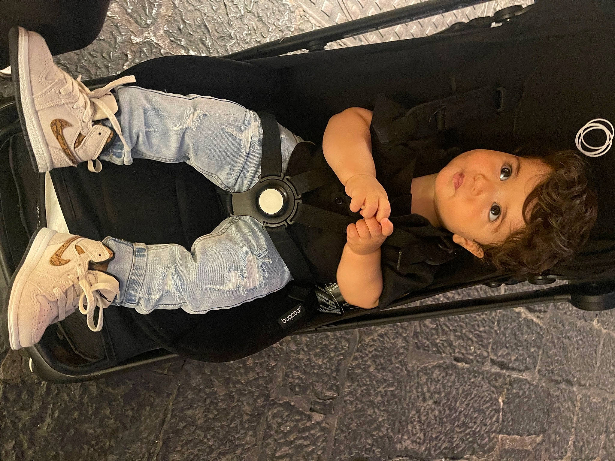 Kian is registered to the contest to win money with this photo: bumper, costume, dress, eyewear, fashion_accessory, flash_photography, flooring, fun, gesture, human_leg, knee, person, sitting, thigh, tree, wood, wrist