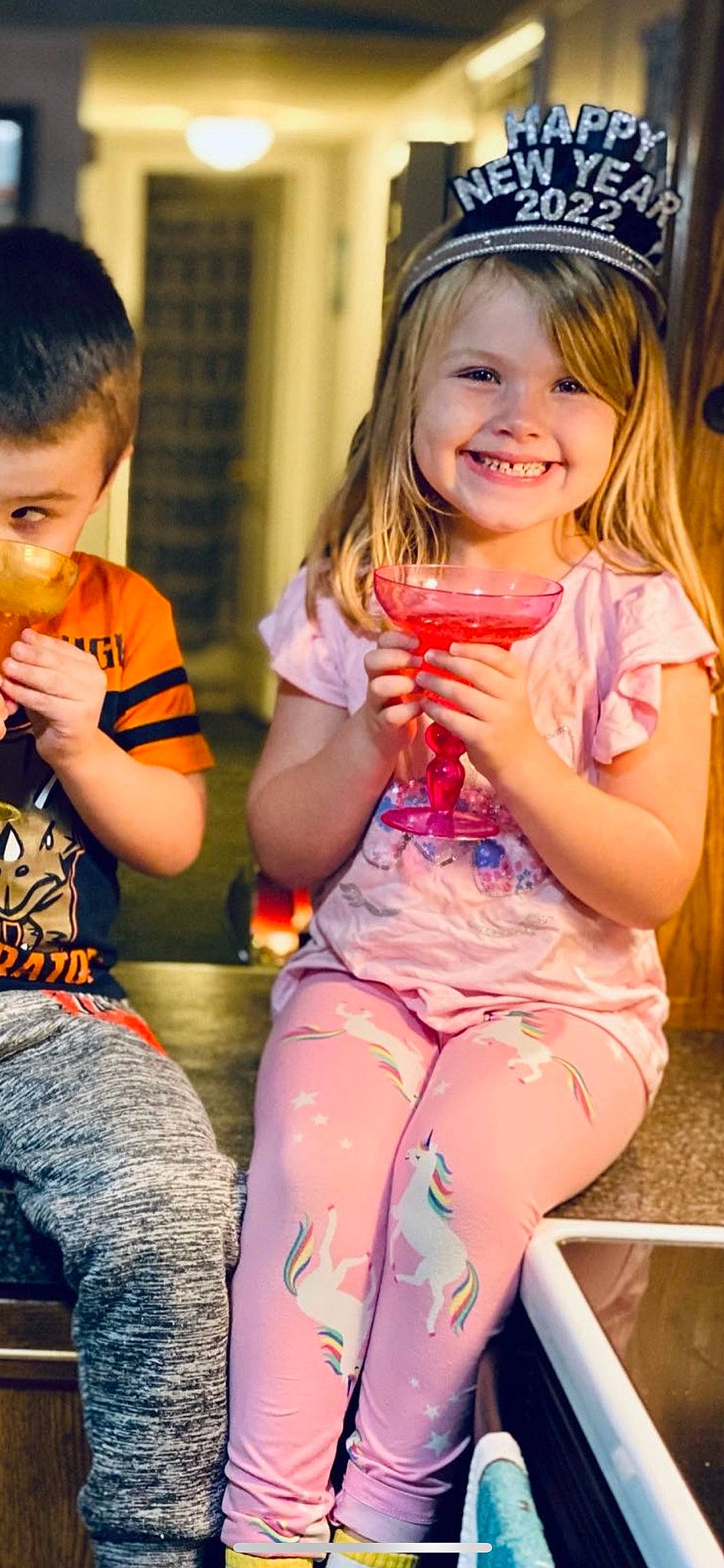 Averey is registered to the contest to win money with this photo: arm, clothing, eye, face, facial_expression, fun, hair, hairstyle, hand, happy, head, human, human_body, joy, organ, person, photograph, pink, skin, smile