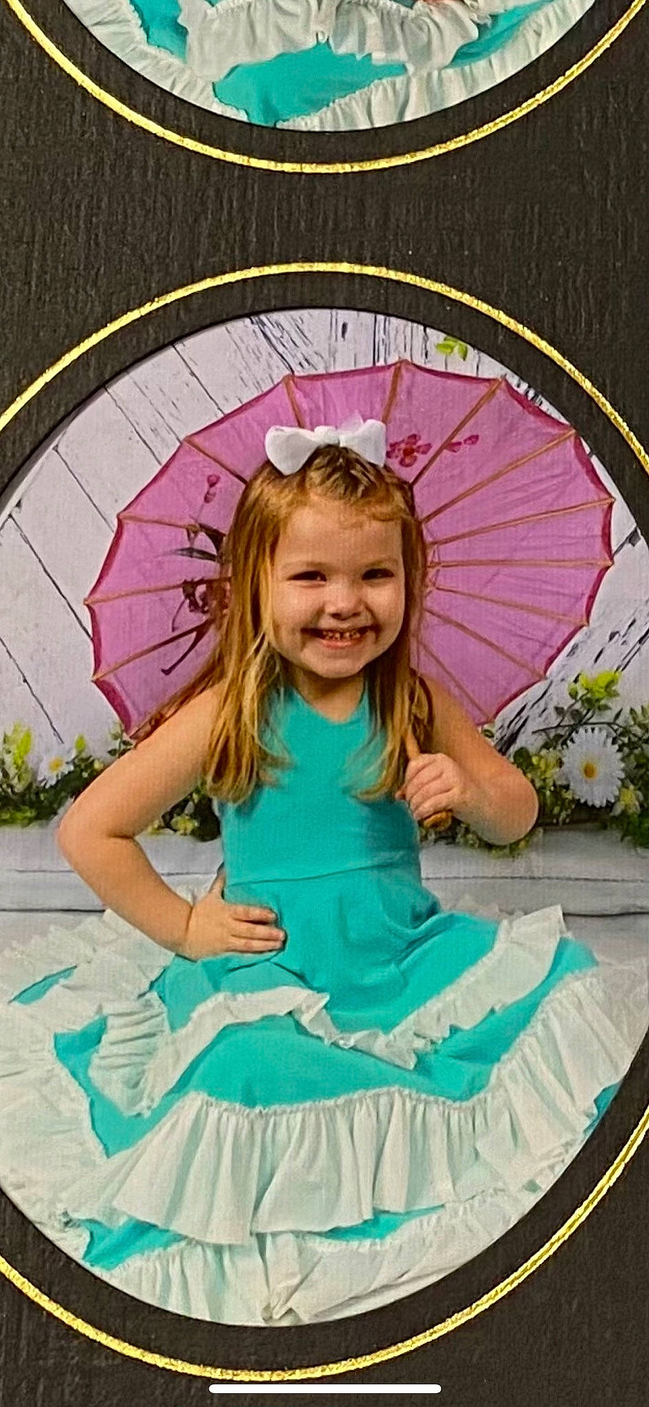 Averey is registered to the contest to win money with this photo: automotive_wheel_system, child, circle, dress, event, facial_expression, fun, hairstyle, happy, headgear, headpiece, joy, magenta, pattern, person, pink, purple, ruffle, smile, textile