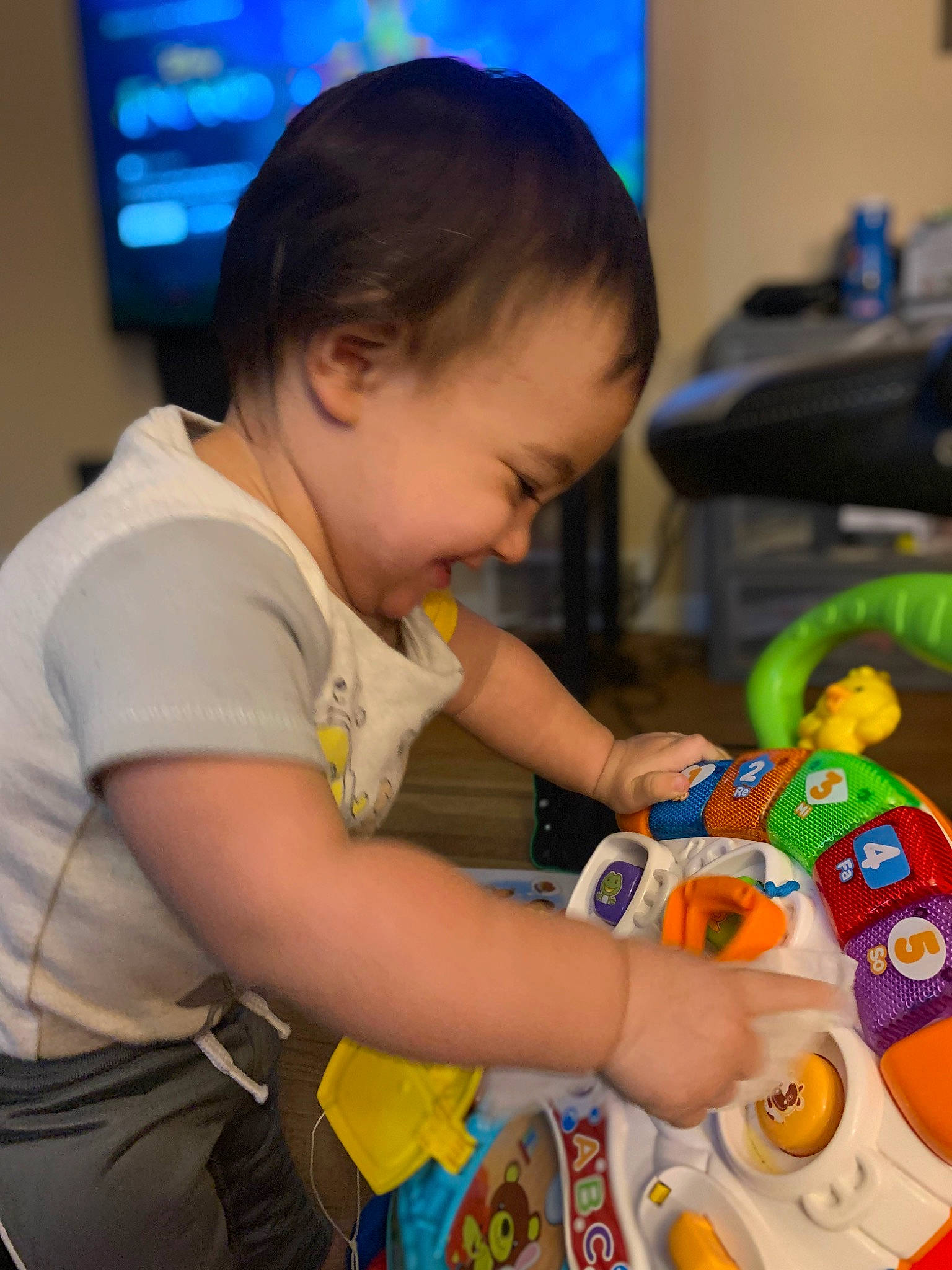 Titus joined the competition — help win amazing prizes! baby, baby_playing_with_toys, child, display_device, event, fun, games, leisure, person, photograph, plastic, play, recreation, room, sharing, snapshot, t_shirt, television, toddler, toy
