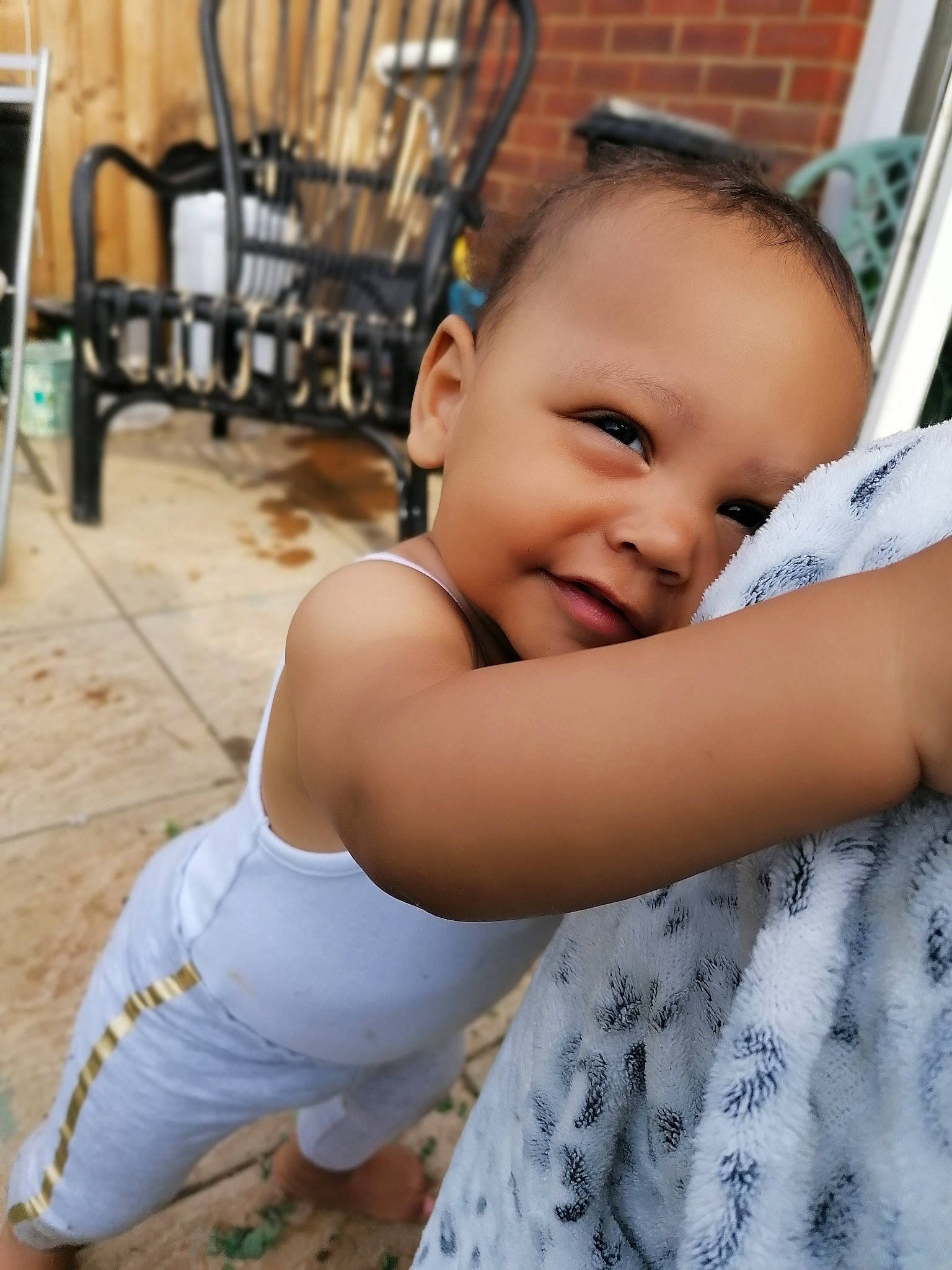 Aubrie is registered to the contest to win money with this photo: baby_toddler_clothing, beauty, bench, child, eye, flash_photography, fun, happy, head, iris, joint, leisure, mammal, person, sitting, skin, smile, t_shirt, thigh, toddler