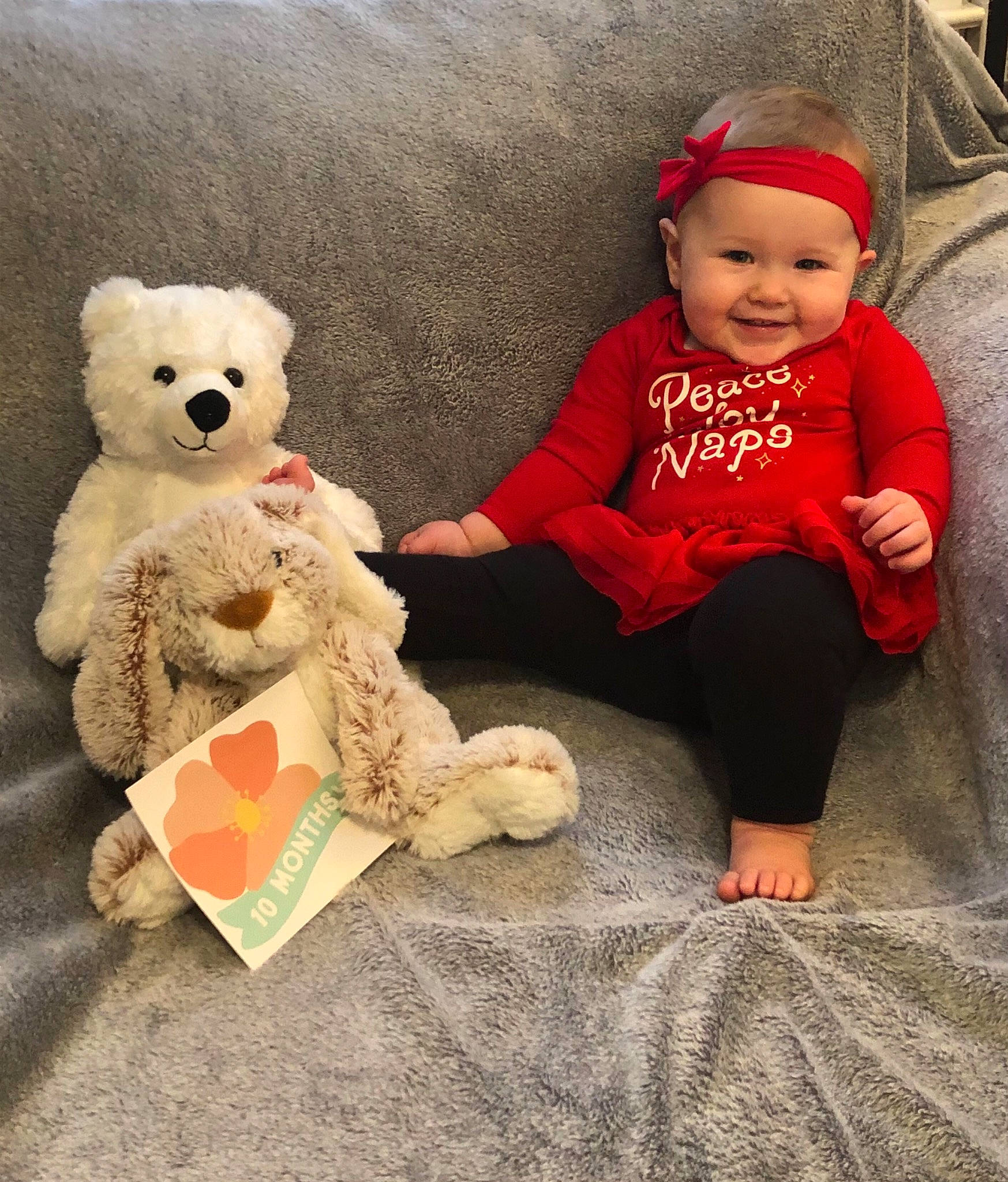 Leona joined the competition — help win amazing prizes! baby, baby_toddler_clothing, bear, cap, comfort, costume_hat, fun, fur, happy, head, headwear, joy, person, plush, skin, sleeve, smile, stuffed_toy, teddy_bear, textile