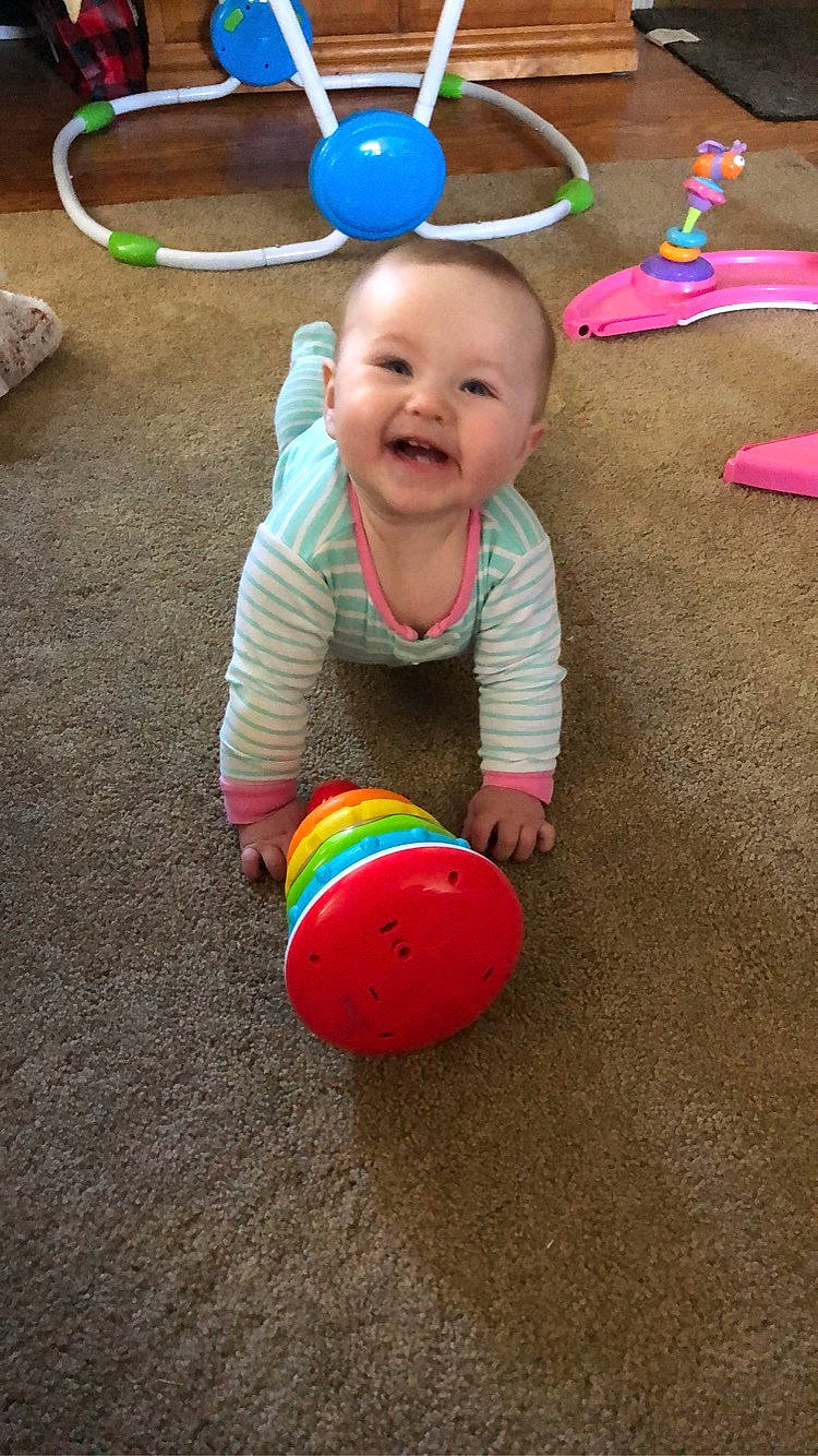 Leona joined the competition — help win amazing prizes! baby, baby_playing_with_toys, baby_toddler_clothing, ball, beauty, child, clothing, facial_expression, flooring, fun, grass, happy, joy, leisure, party_supply, person, play, playing_sports, smile, sports_toy