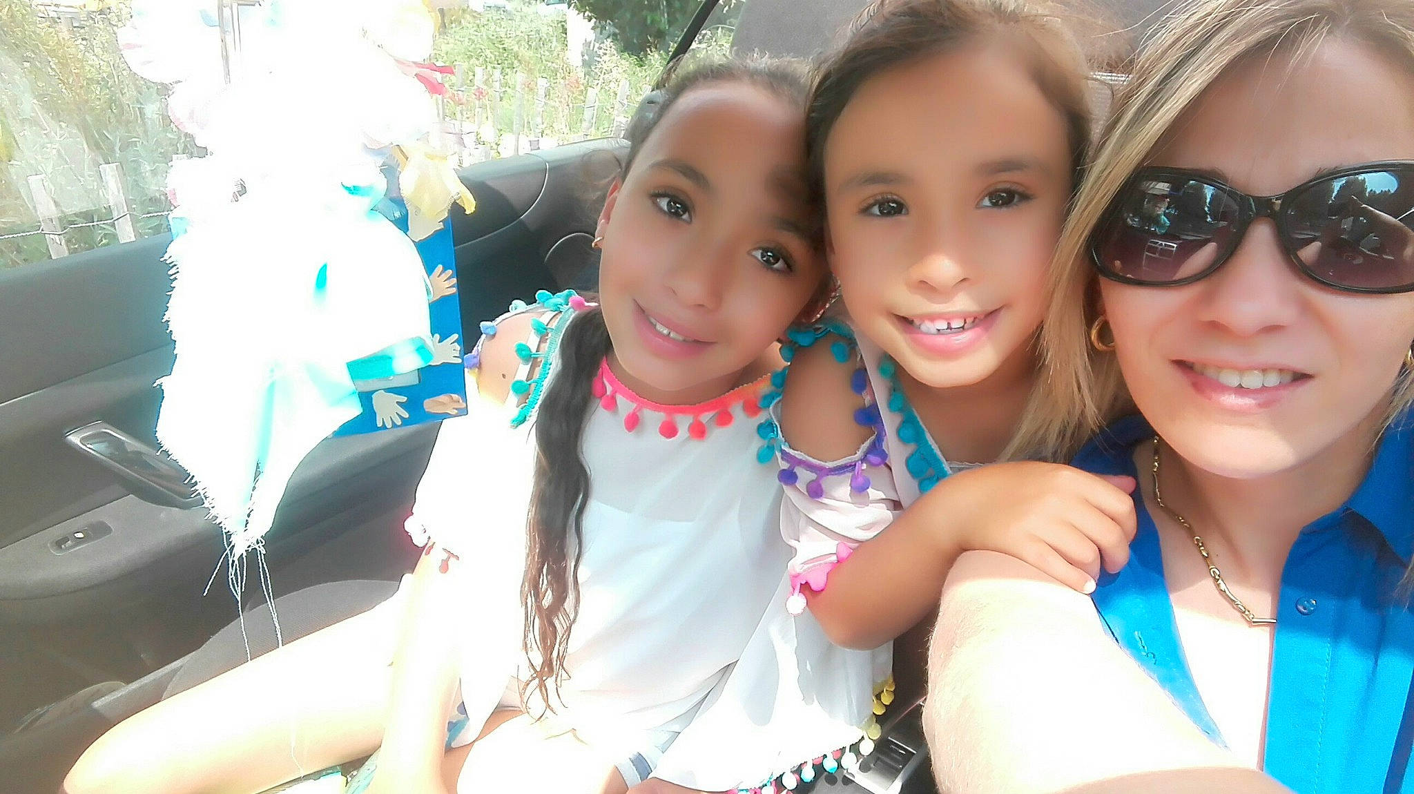 Elissa participe au concours pour gagner de l'argent avec cette photo : black_hair, child, cool, friendship, fun, girl, happiness, joy, person, pink, product, skin, smile, summer, vacation