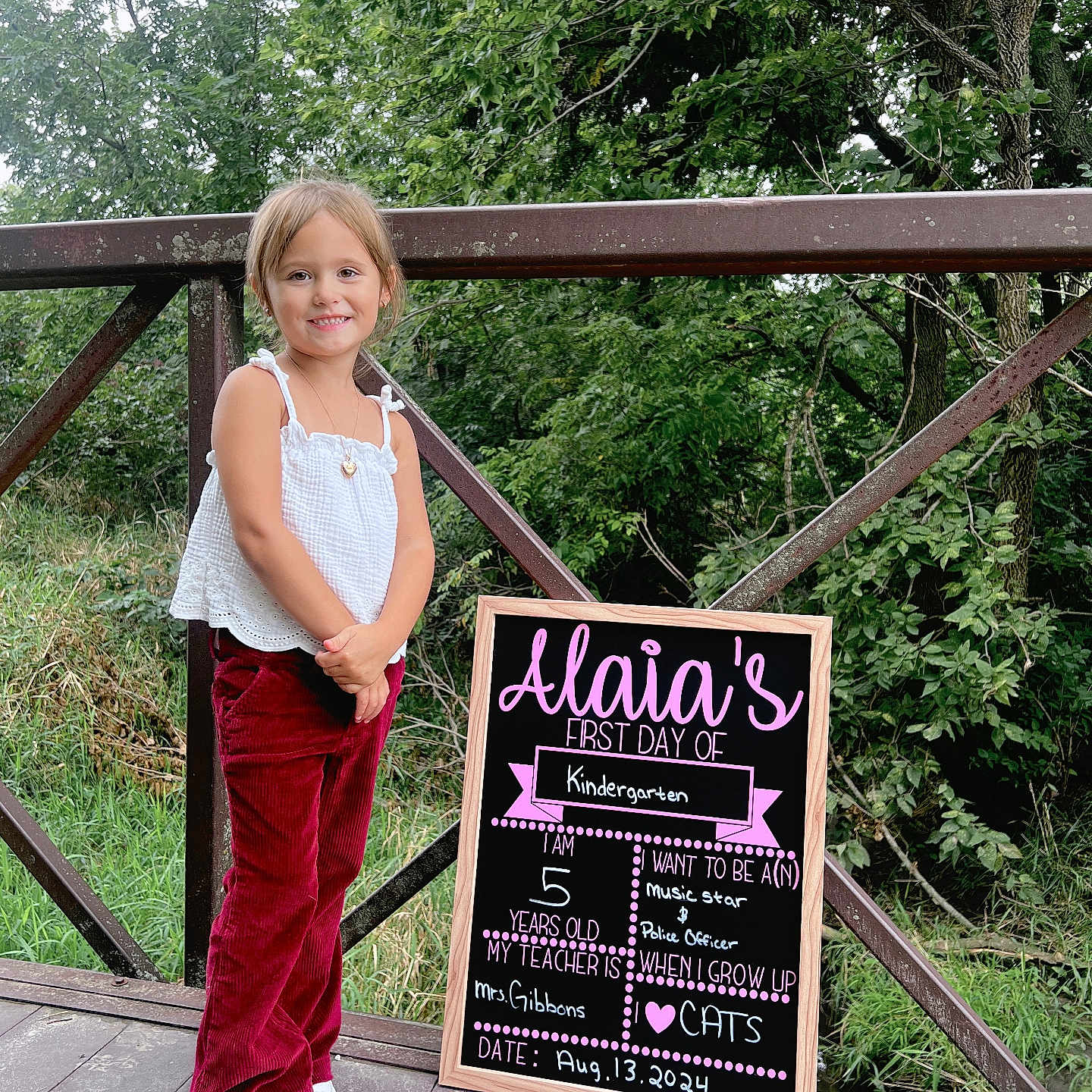 Alaia joined the competition — help win amazing prizes! accessories, blackboard, child, clothing, face, female, footwear, girl, head, jewelry, necklace, pants, person, photography, plant, portrait, shoe, tree, vegetation, wood