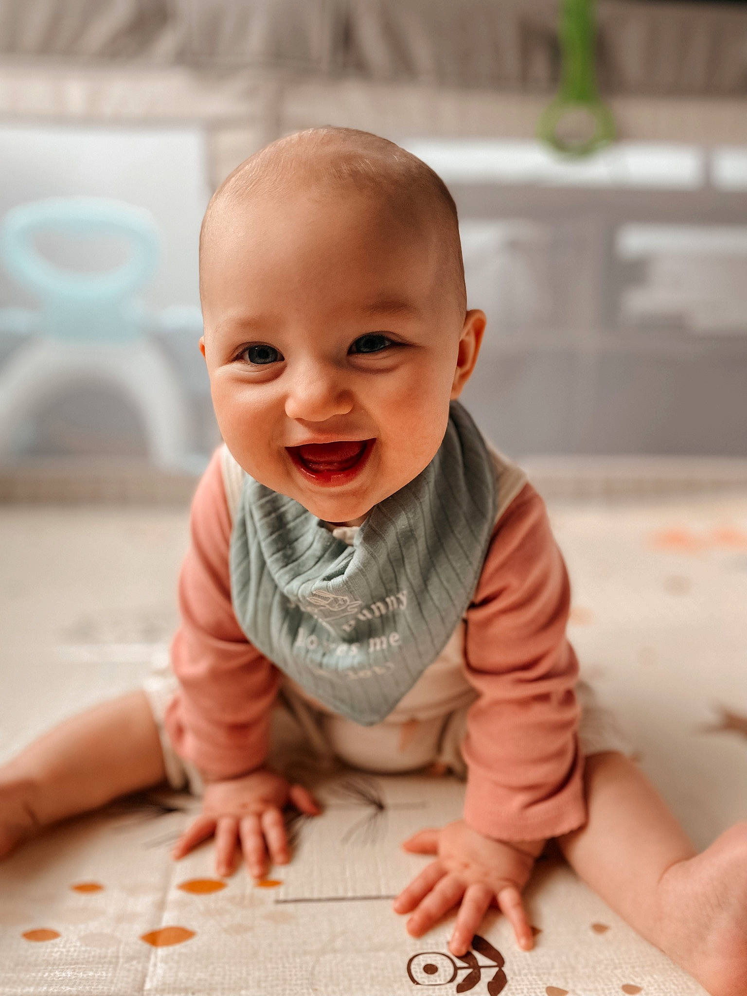 Kailani joined the competition — help win amazing prizes! baby, baby_toddler_clothing, cheek, chin, dress, facial_expression, finger, floor, flooring, gesture, hand, happy, lip, mouth, nose, person, skin, sleeve, smile, toddler