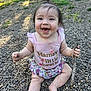 baby, child, cute, dirt, fence, grass, happy, nature, outdoor, pebbles, person, pink_clothing, playful, portrait, sitting, skirt, smiling, stick, sunlight, toddler