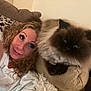 Gayda is registered to the contest to win money with this photo: animal, armrest, casual, cat, closeup, companion, couch, cozy, curly_hair, domestic, feline, fluffy_cat, furniture, indoor, pet, portrait, relaxed, resting, sofa, woman