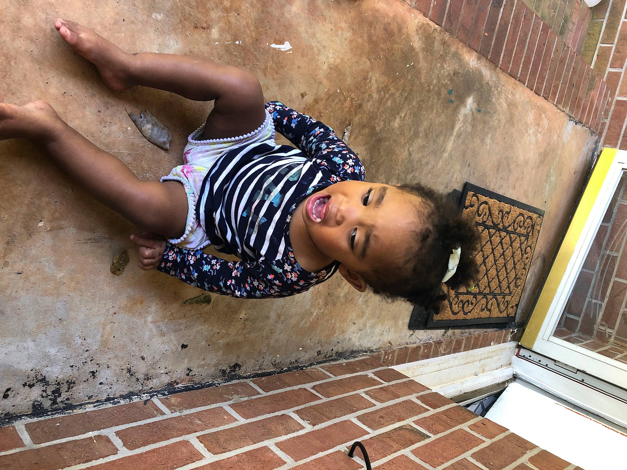 Javianna joined the competition — help win amazing prizes! beauty, black_hair, brick, eyewear, flash_photography, flooring, glasses, human_leg, leisure, person, public_space, road_surface, sidewalk, sunglasses, temple, thigh, tints_and_shades, waist, wall, water