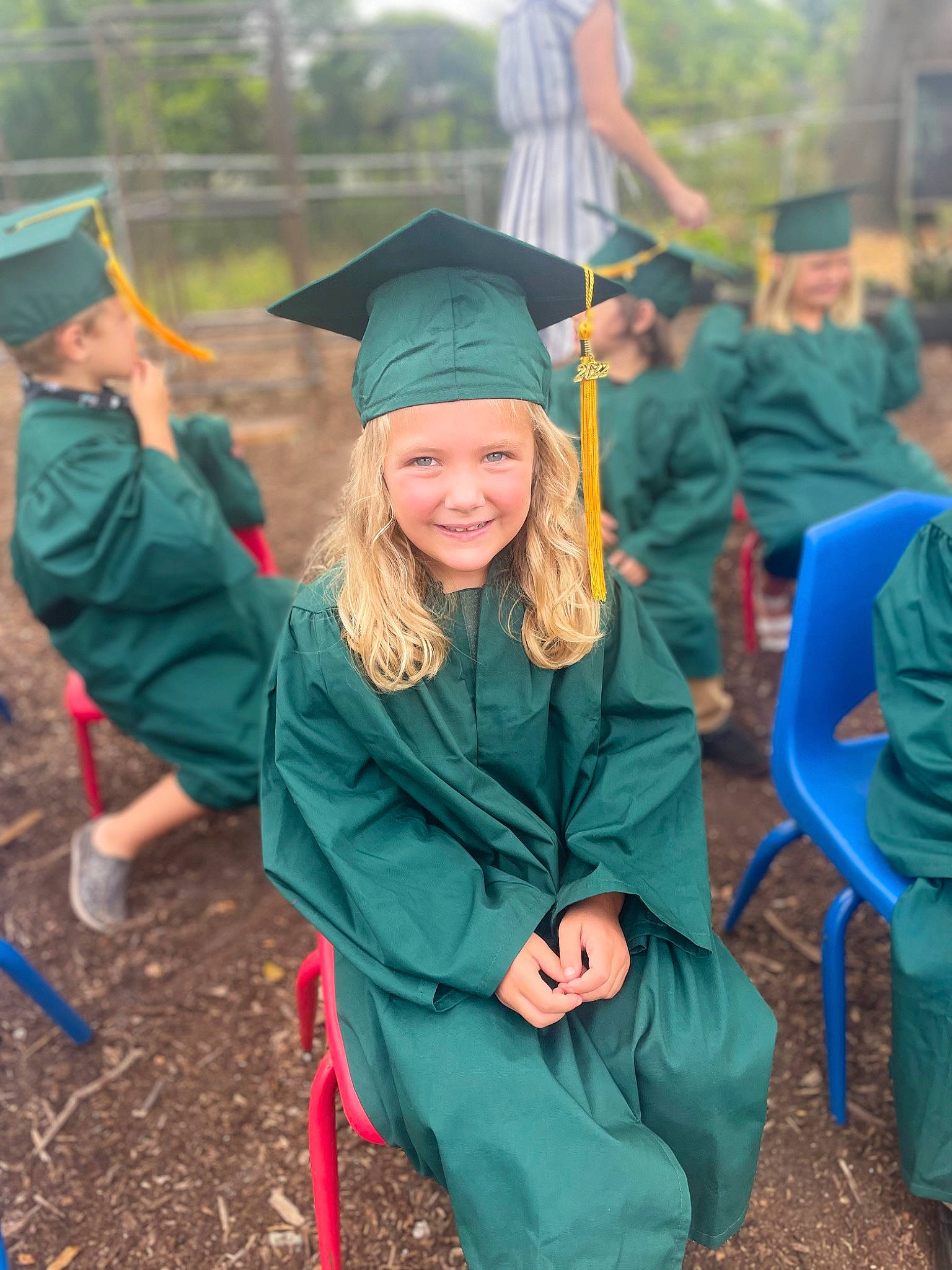 Vayda is registered to the contest to win money with this photo: academic_dress, academic_institution, adaptation, blue, community, event, fun, graduation, grass, green, happy, headgear, headwear, joy, leaf, mortarboard, people_in_nature, person, recreation, scholar
