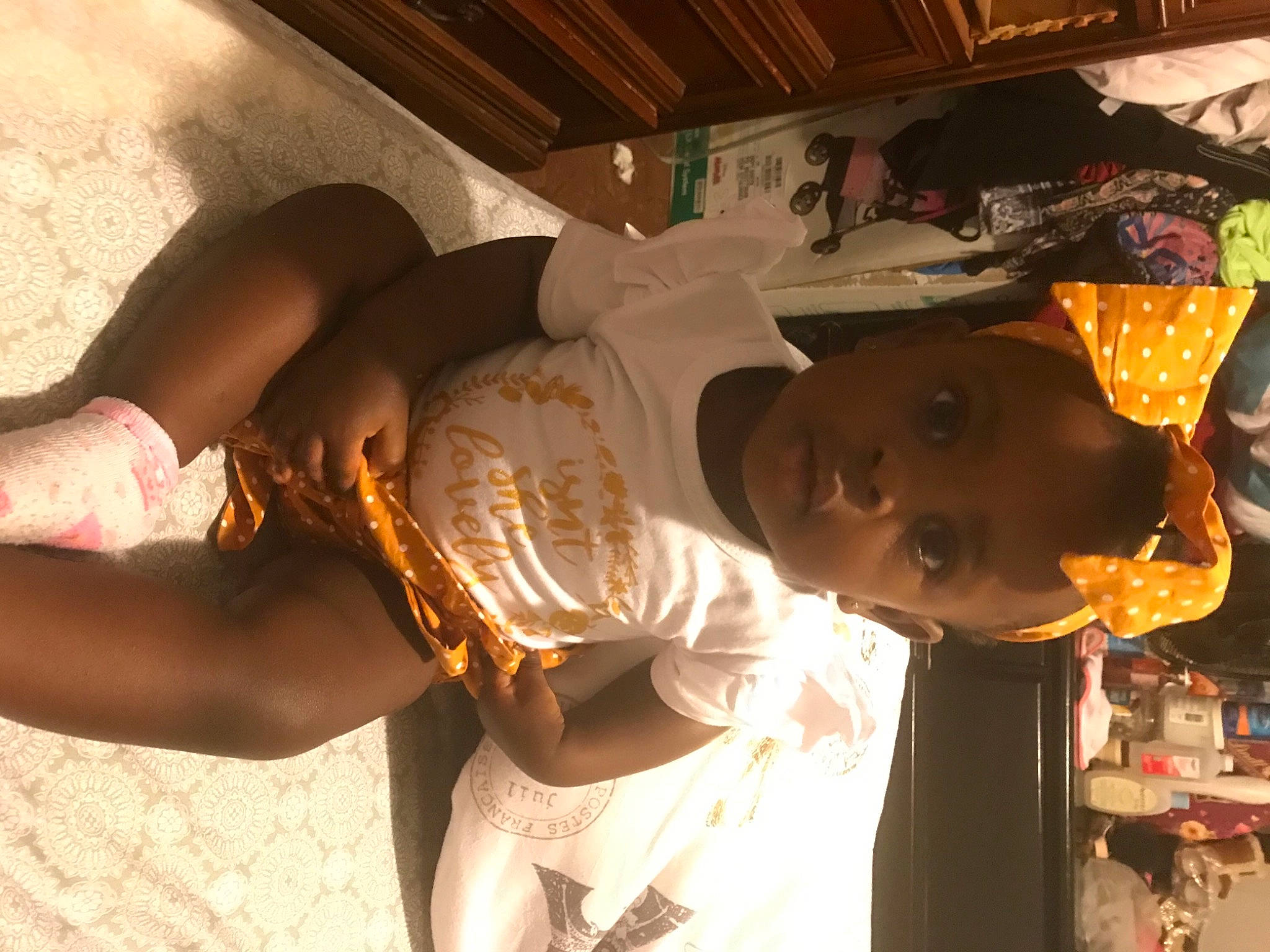 Autumn is registered to the contest to win money with this photo: abdomen, black_hair, child, elbow, event, flash_photography, flesh, fun, hairstyle, happy, hat, human_leg, knee, person, room, t_shirt, temple, thigh, tradition, trunk