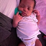 Tashayla is registered to the contest to win money with this photo: baby, blanket, child, cuddly, cute, diaper, indoors, infant, newborn, onesie, pacifier, peaceful, pink, portrait, relaxed, resting, sleeping, small, soft, toddler