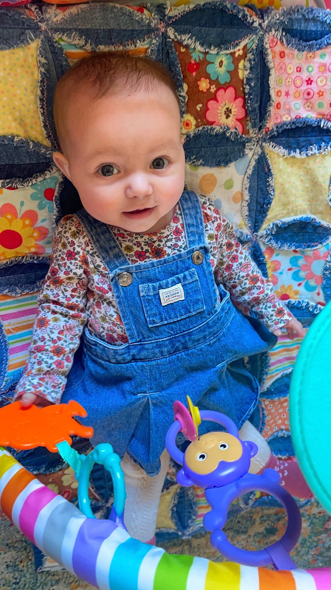 Brinley joined the competition — help win amazing prizes! azure, baby, baby_toddler_clothing, blue, cheek, child, dress, electric_blue, fun, happy, iris, linens, orange, pattern, person, pink, purple, room, skin, textile