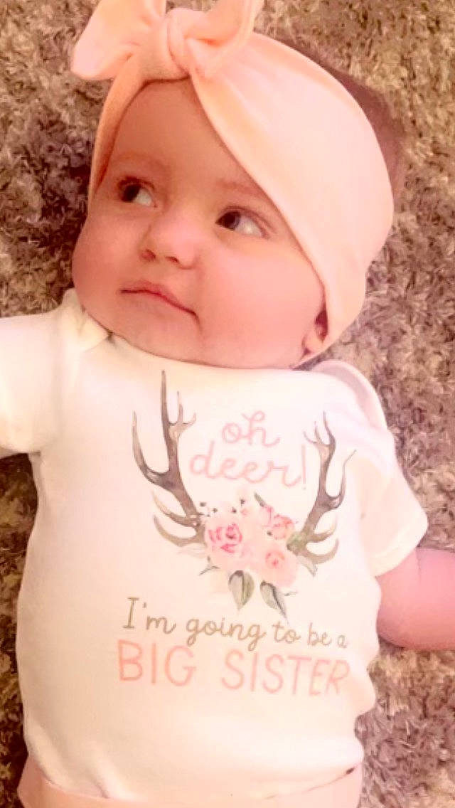 Brinley is registered to the contest to win money with this photo: baby, baby_toddler_clothing, beauty, cap, cheek, child, cool, eyebrow, eyelash, face, facial_expression, happy, headwear, lip, nose, person, pink, skin, sleeve, smile