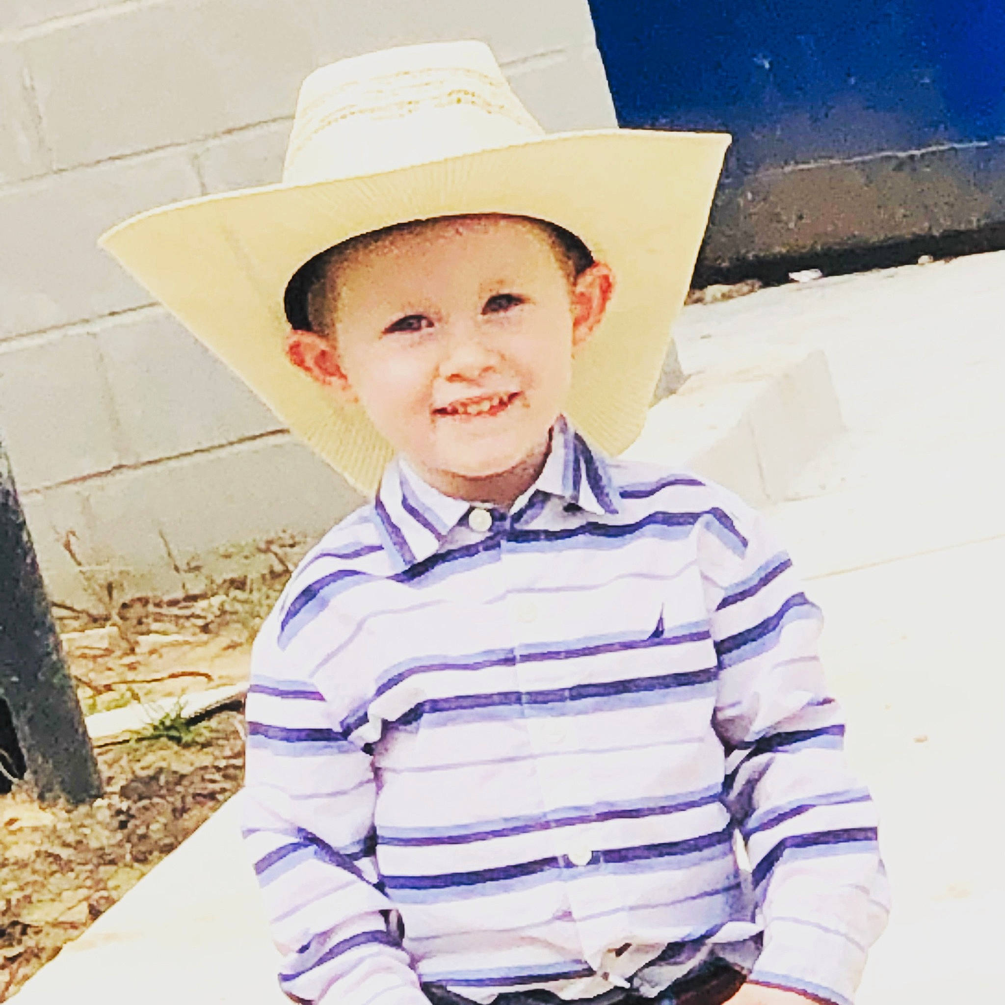 Garrett is registered to the contest to win money with this photo: beauty, cap, cool, electric_blue, face, facial_expression, flash_photography, hairstyle, happy, hat, headgear, human, jaw, joy, lip, neck, people, person, sleeve, smile