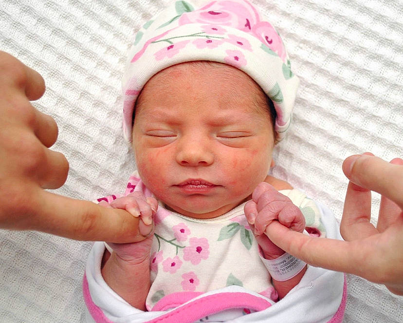 Blakely is registered to the contest to win money with this photo: baby, baby_sleeping, baby_toddler_clothing, cheek, chin, comfort, ear, eye, eyebrow, face, finger, gesture, hand, head, headwear, lip, mouth, neck, nose, person