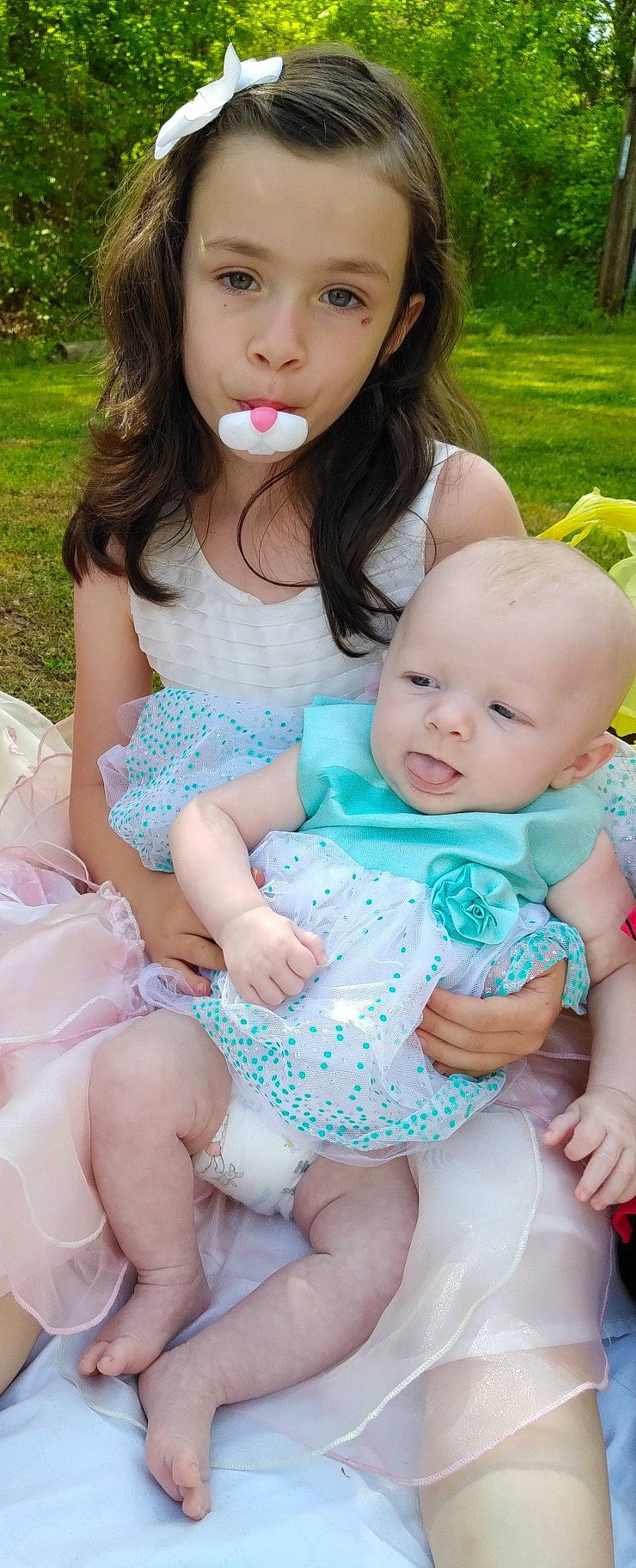 Rayne joined the competition — help win amazing prizes! baby_toddler_clothing, cheek, face, facial_expression, fun, grass, green, hairstyle, happy, lip, organ, people, person, photograph, pink, plant, skin, summer, thigh, toddler