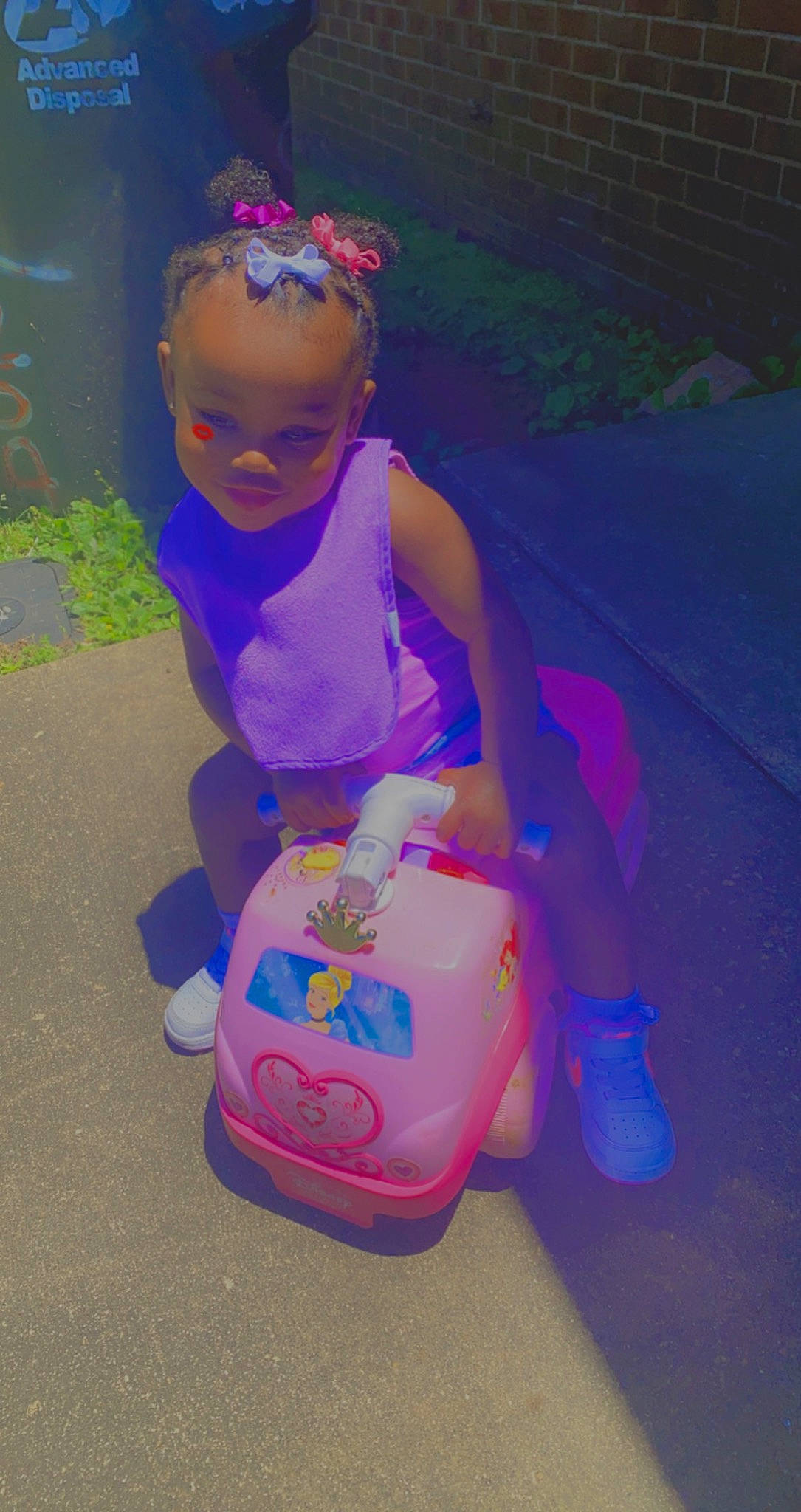 Zhara joined the competition — help win amazing prizes! baby_products, baby_toys, child, electric_blue, fun, goggles, grass, happy, head, human_body, leisure, magenta, person, pink, purple, recreation, riding_toy, tire, toddler, toy