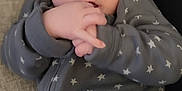 Jackson joined the competition — help win amazing prizes! baby, bodypart, clothing, couch, cushion, face, finger, furniture, hand, head, homedecor, hoodie, knitwear, newborn, pants, person, photography, portrait, sweater, sweatshirt
