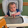 Jackson joined the competition — help win amazing prizes! baby, chair, child, clothing, expression, face, furniture, graco, green_wall, hands, high_chair, indoor, infant, person, reflection, seat, sitting, table, tray, wood