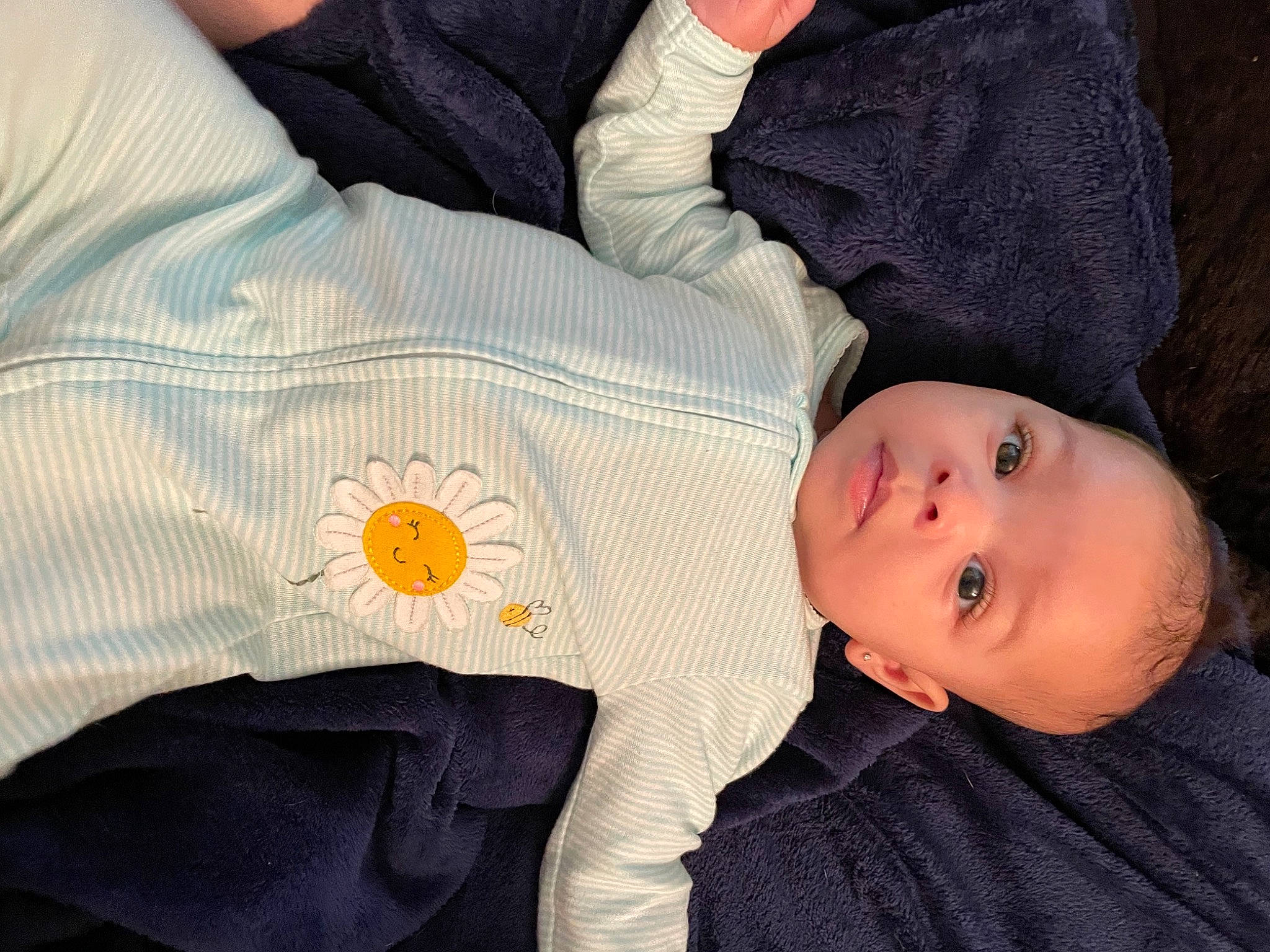 Milan joined the competition — help win amazing prizes! baby, baby_products, baby_toddler_clothing, button, child, collar, comfort, dress_shirt, flower, grey, human_body, linens, pattern, person, petal, product, sitting, skin, sleeve, textile