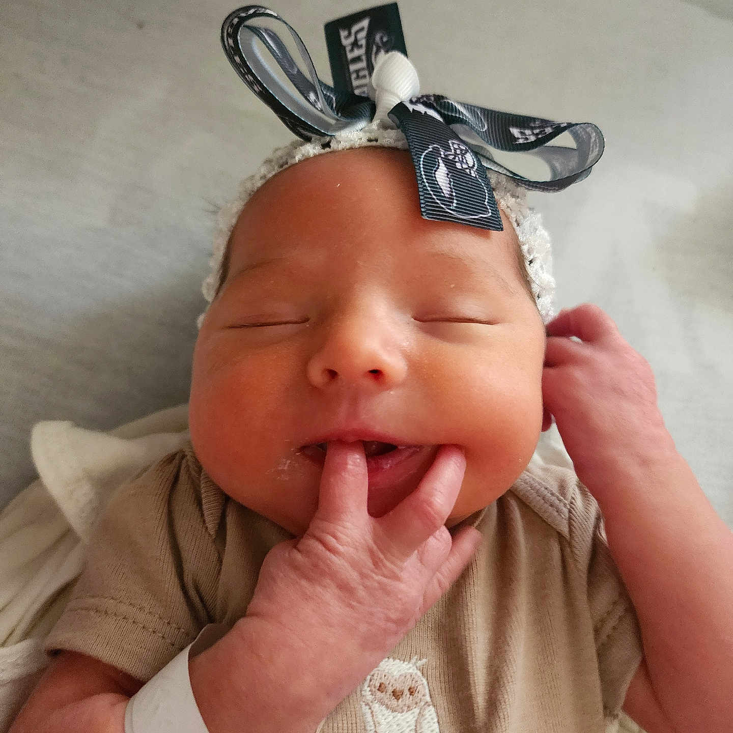Catherine joined the competition — help win amazing prizes! accessories, baby, bodypart, bonnet, clothing, couch, face, finger, furniture, hand, hat, head, jewelry, newborn, person, photography, portrait, ring, smokepipe, wrist